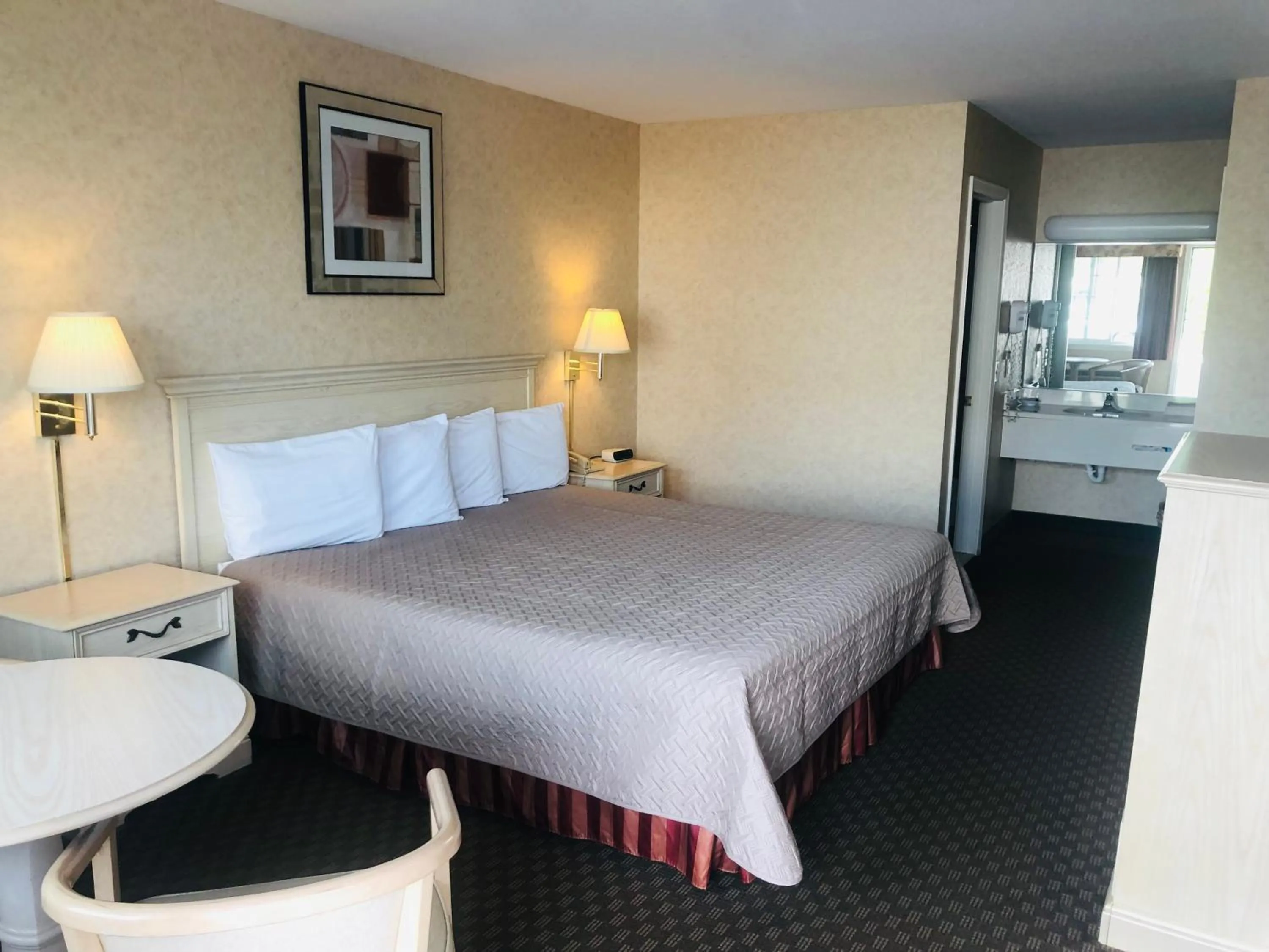 Photo of the whole room, Bed in Court Plaza Inn & Suites of Mackinaw