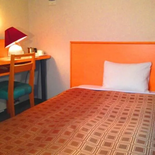 Bed in Takasaki Ekimae Plaza Hotel