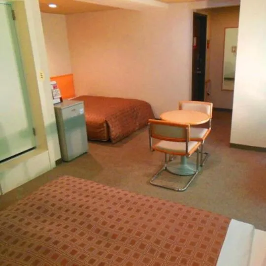 Bed in Takasaki Ekimae Plaza Hotel