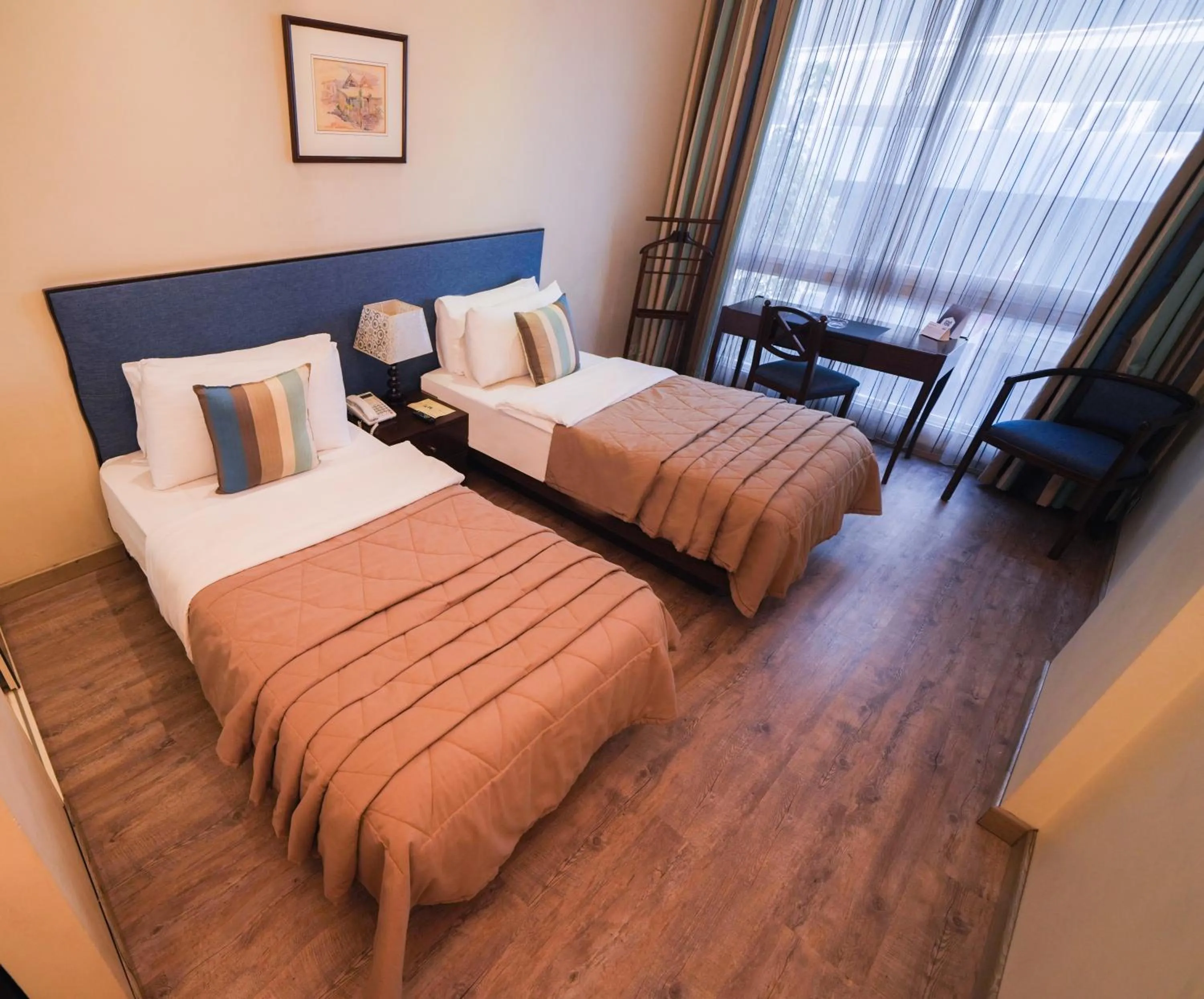 Bed in Casa D'or Hotel