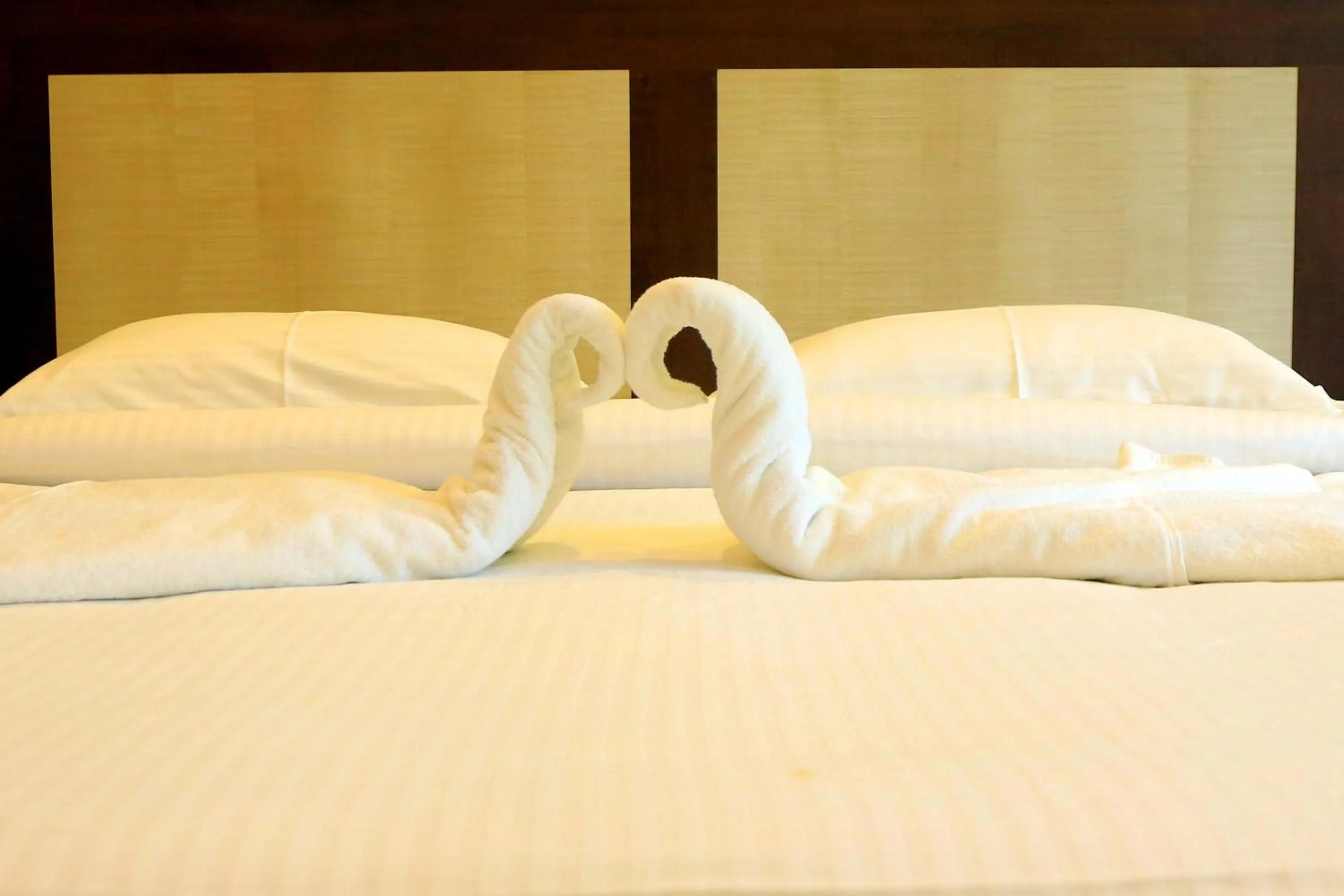 Bed in Sri Maharaja Residency