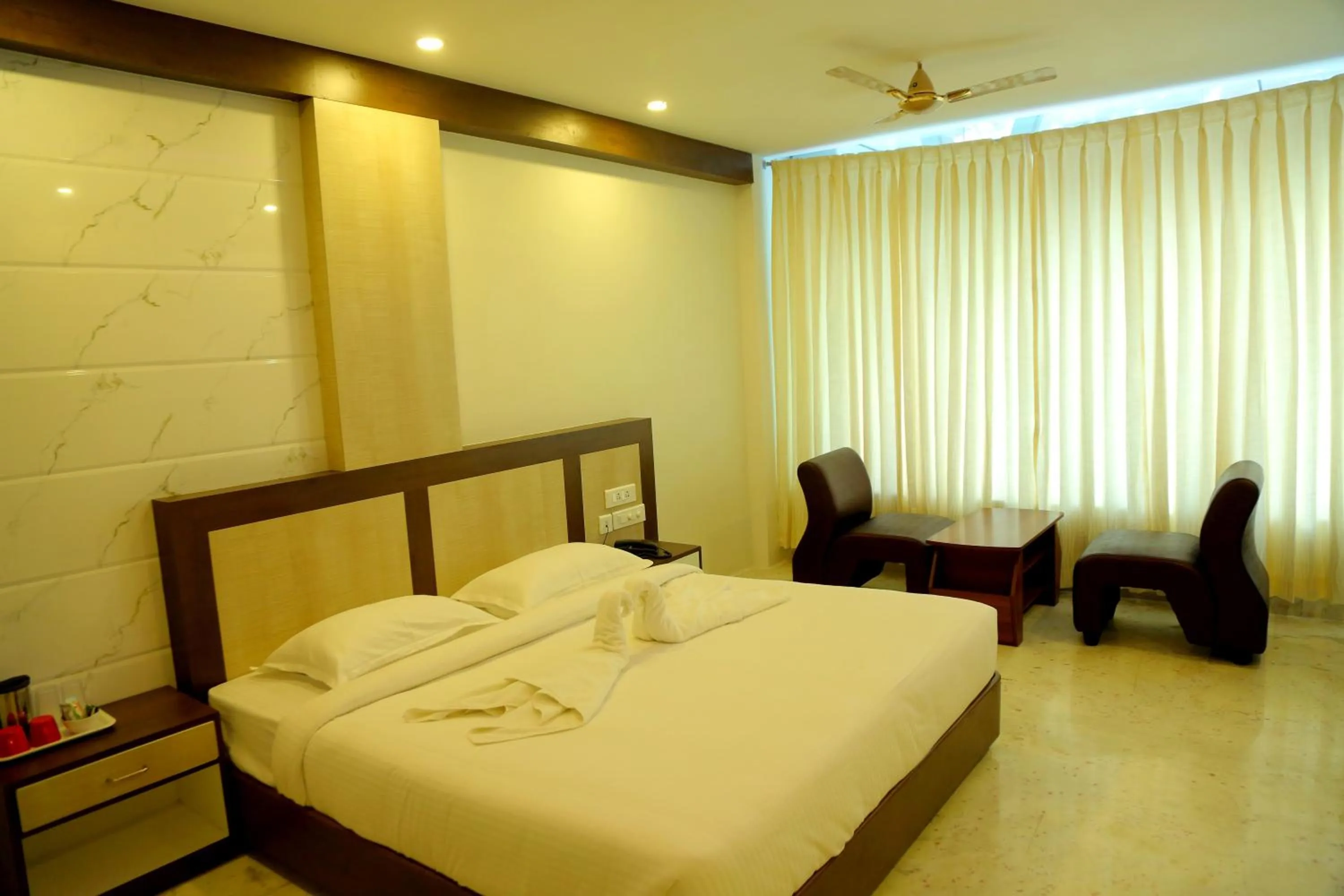 Bed in Sri Maharaja Residency