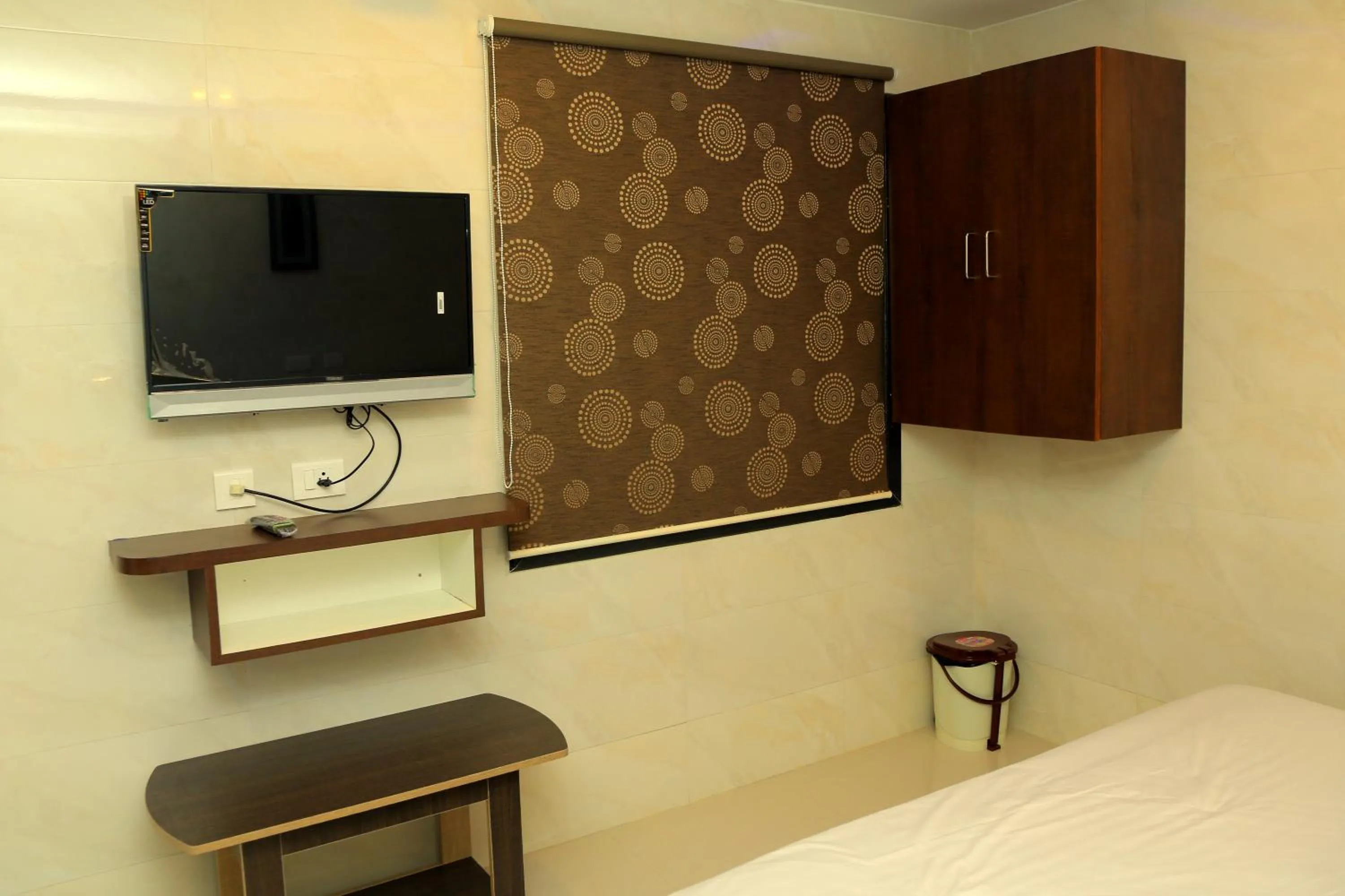 Bed in Sri Maharaja Residency