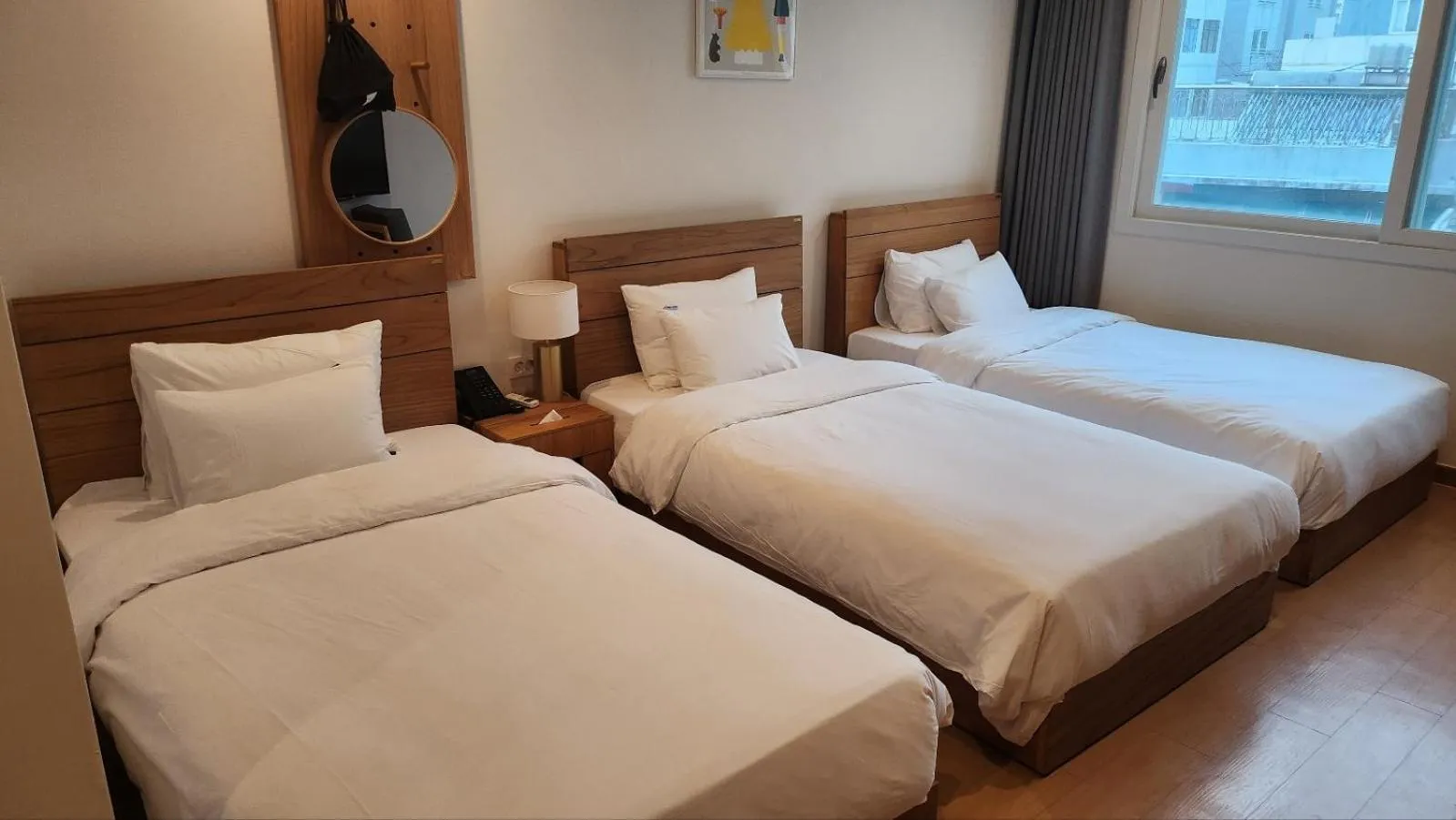 Bed in Heyy Seogwipo Hotel