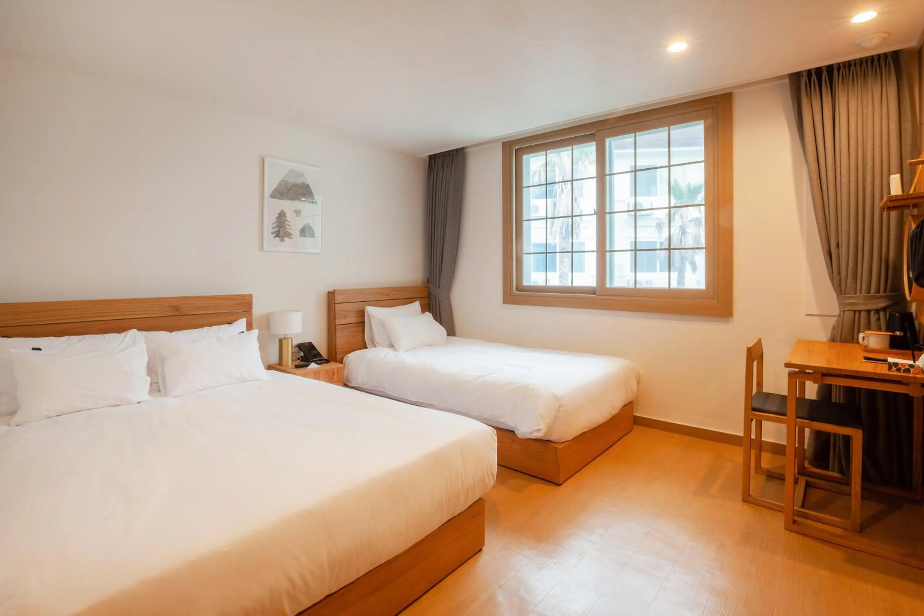 Bed in Heyy Seogwipo Hotel