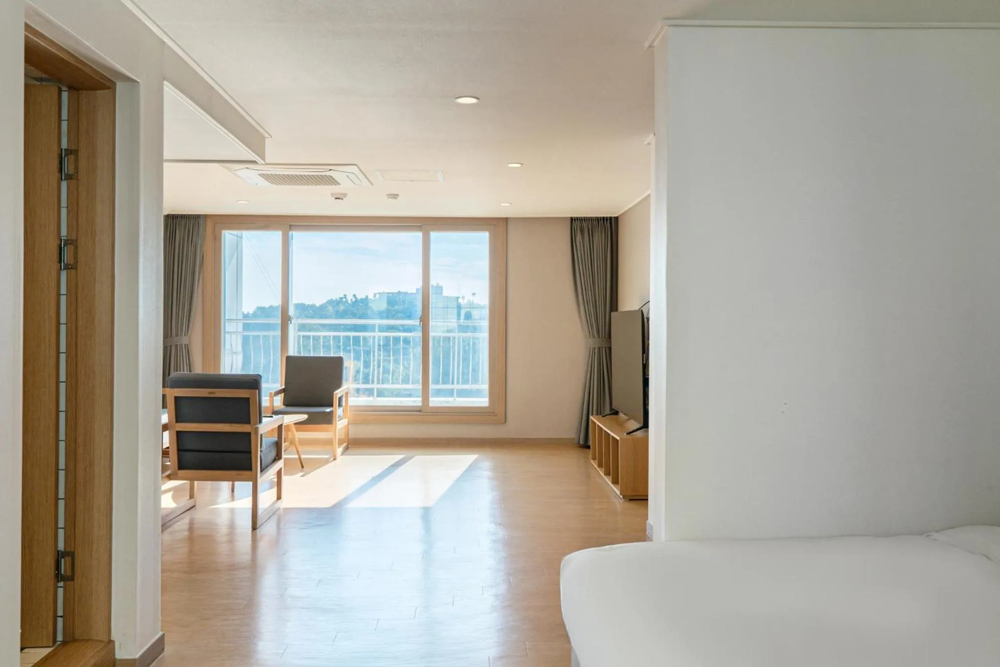 Bed in Heyy Seogwipo Hotel