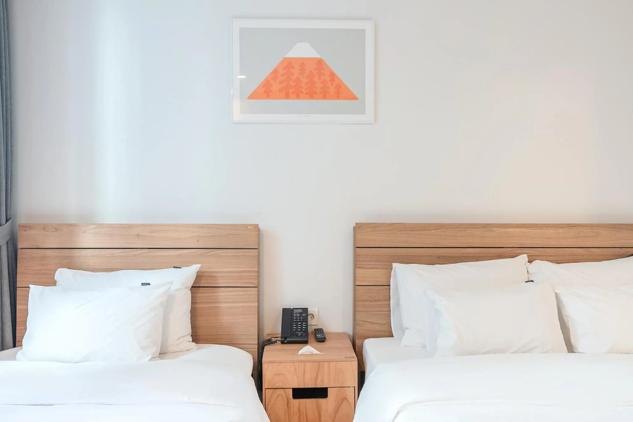 Bed in Heyy Seogwipo Hotel