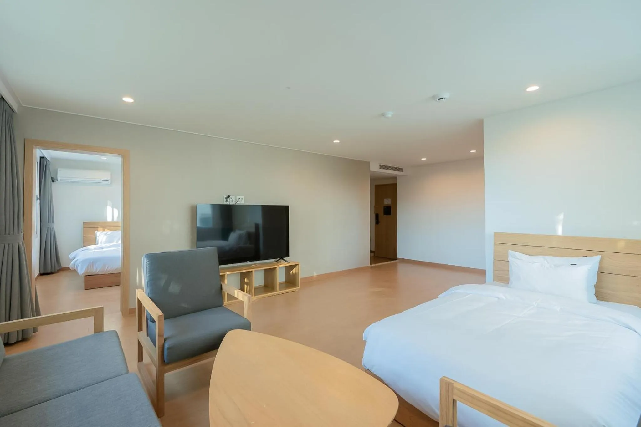 Bed in Heyy Seogwipo Hotel