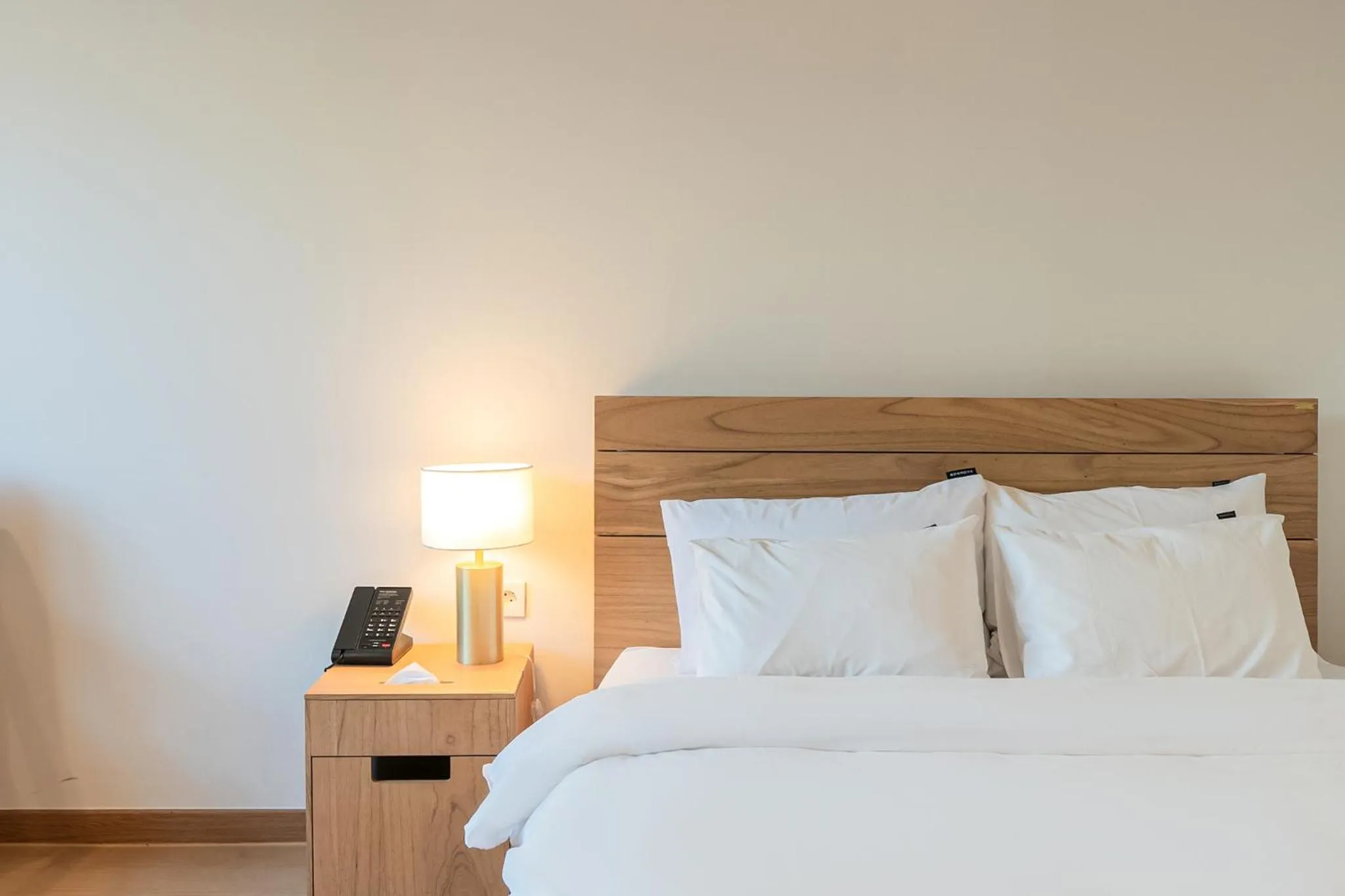 Bed in Heyy Seogwipo Hotel