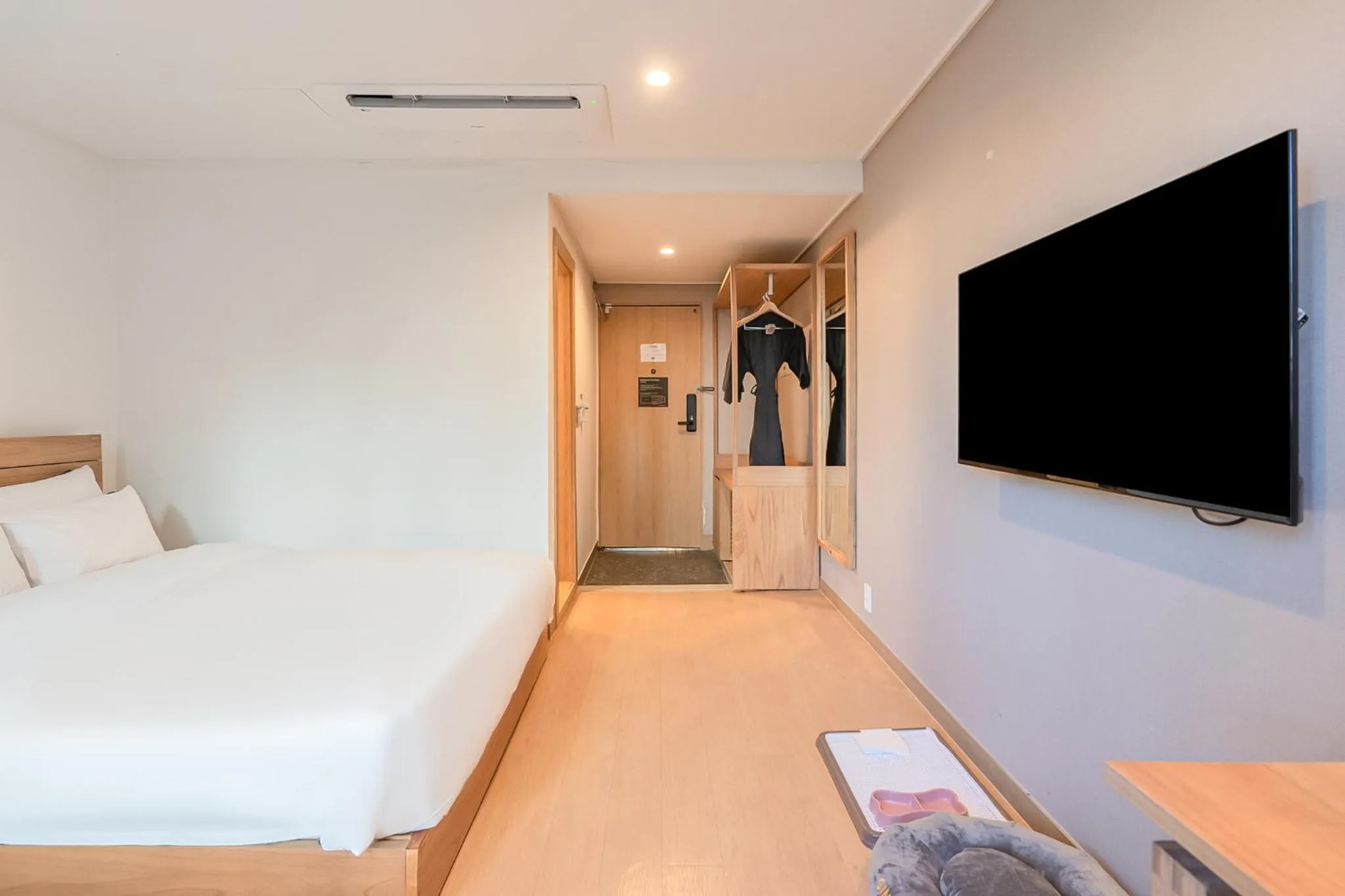 Bed in Heyy Seogwipo Hotel