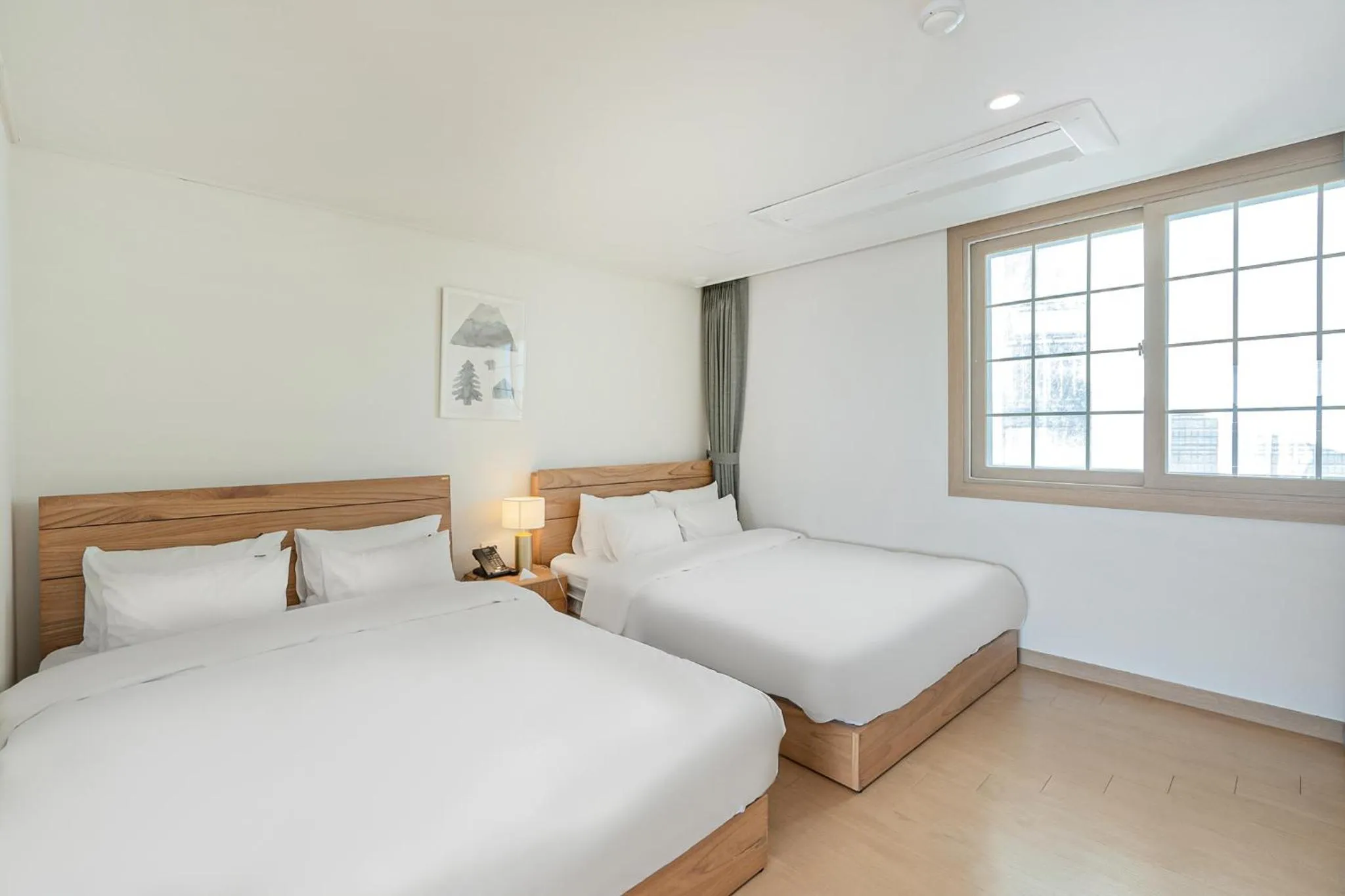 Bed in Heyy Seogwipo Hotel