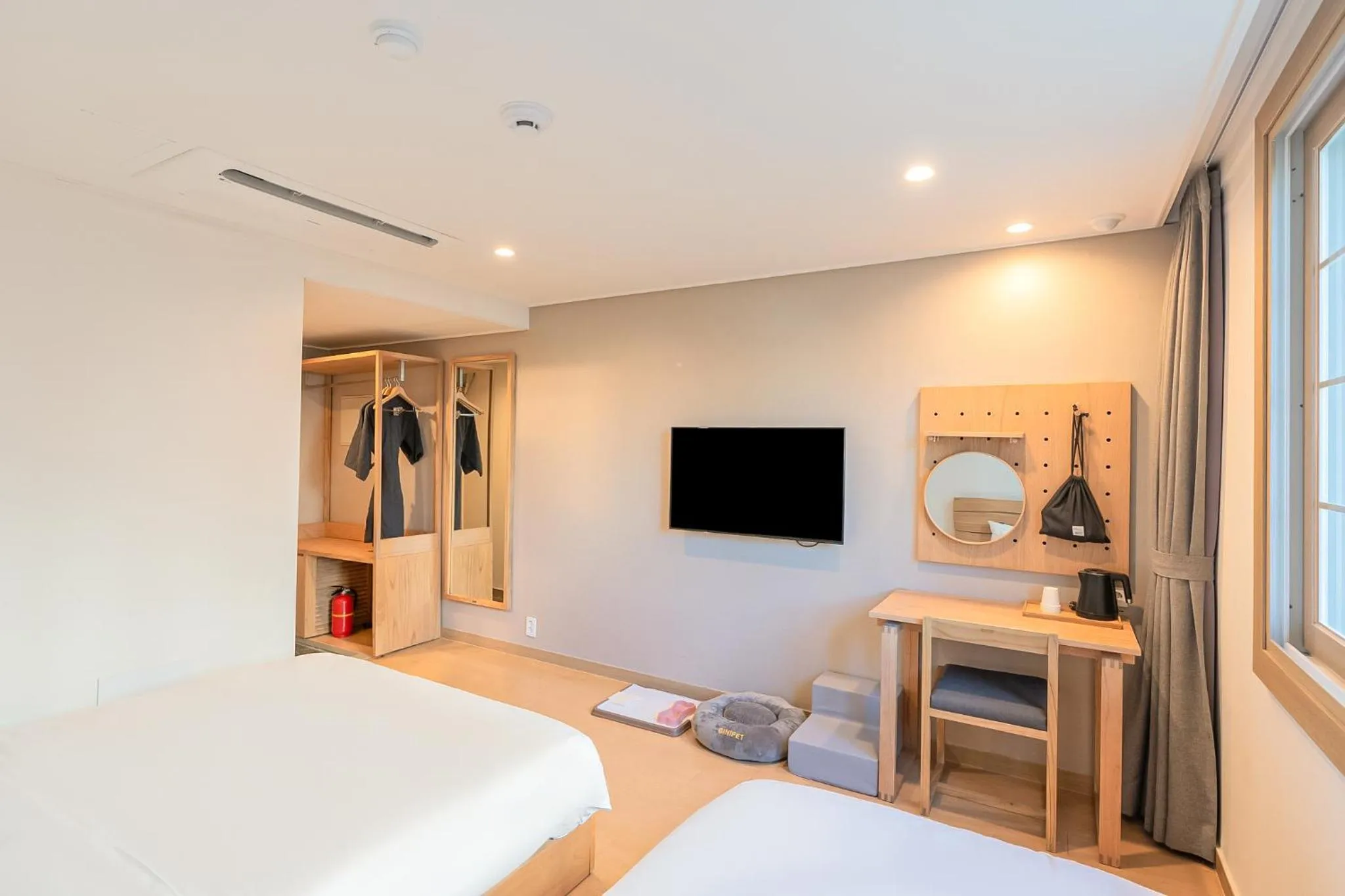 Bed in Heyy Seogwipo Hotel