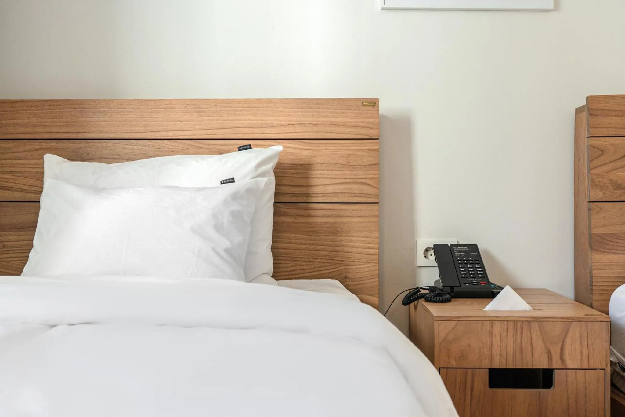 Bed in Heyy Seogwipo Hotel