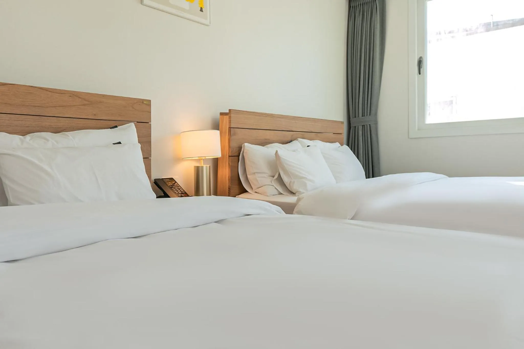 Bed in Heyy Seogwipo Hotel