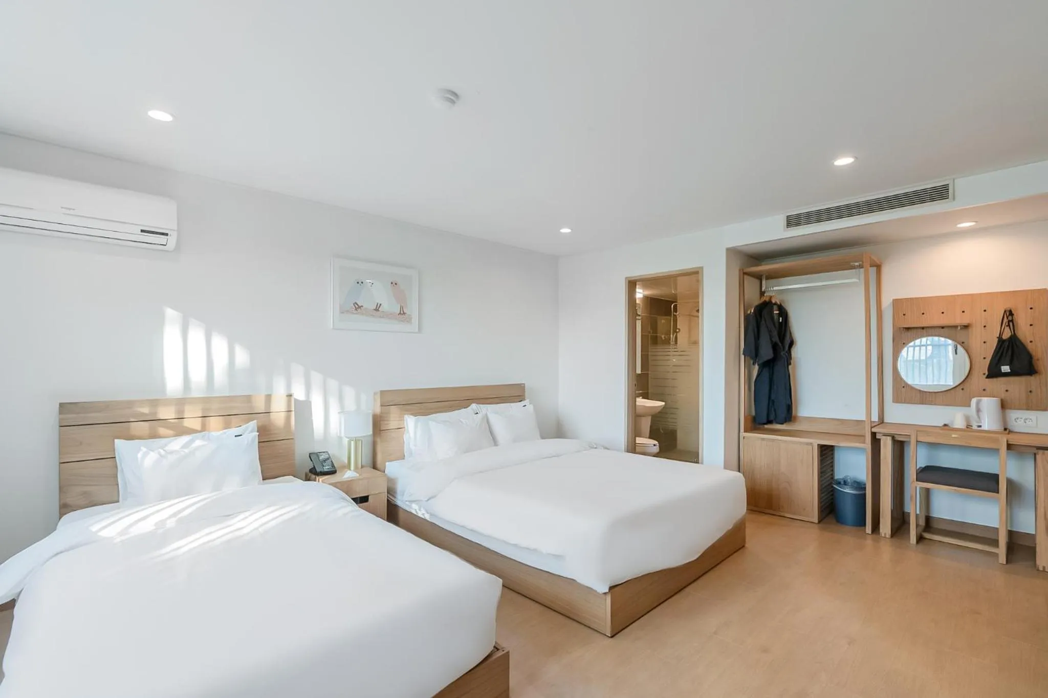 Bed in Heyy Seogwipo Hotel