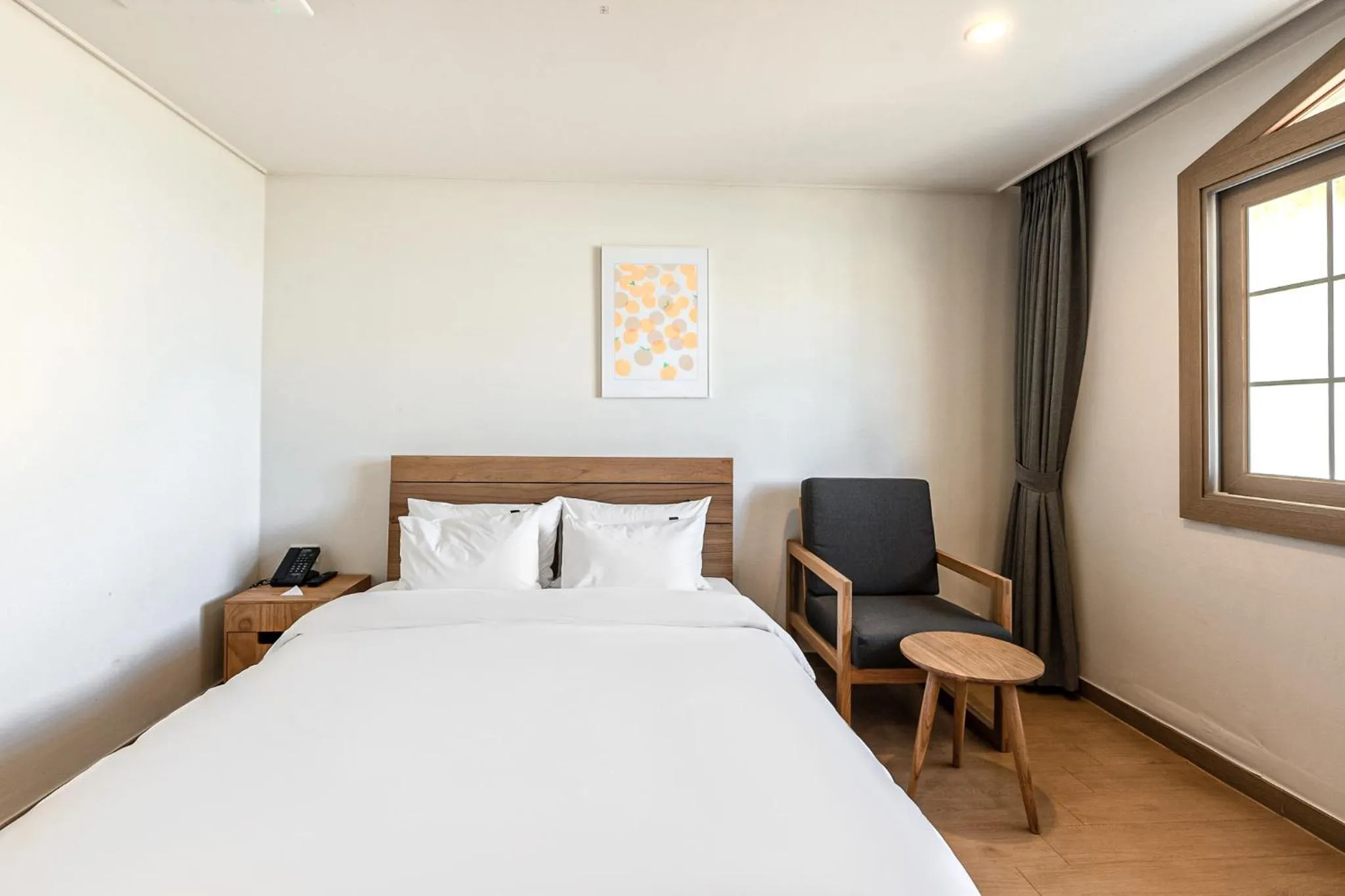 Bed in Heyy Seogwipo Hotel