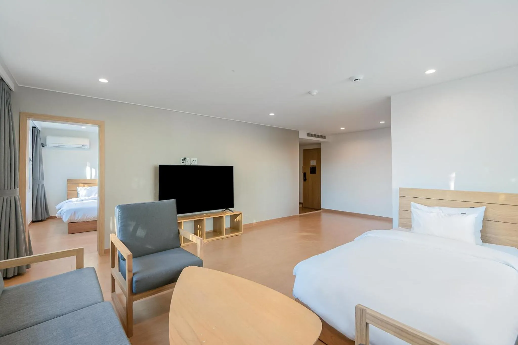 Bed in Heyy Seogwipo Hotel