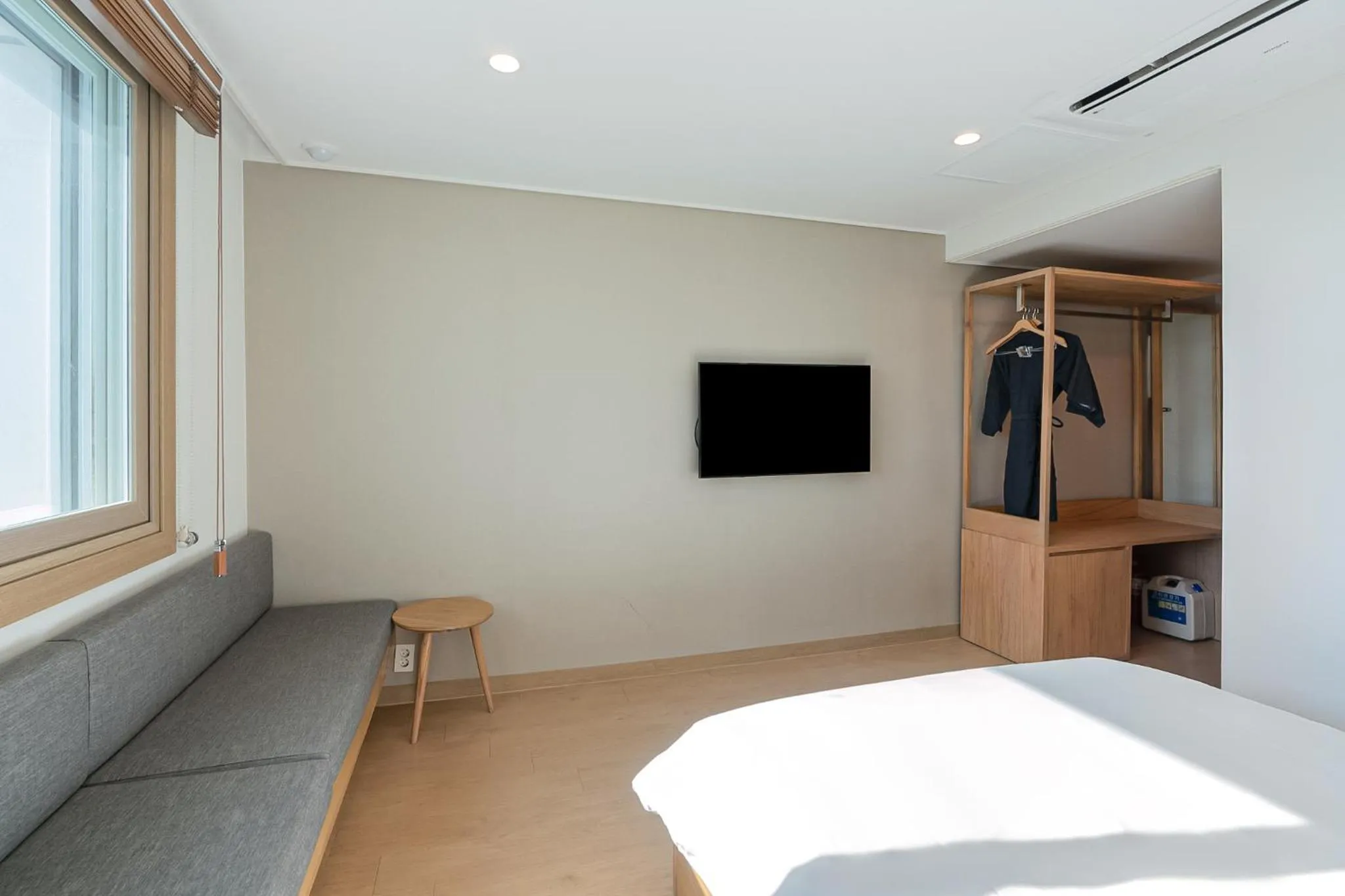 Bed in Heyy Seogwipo Hotel