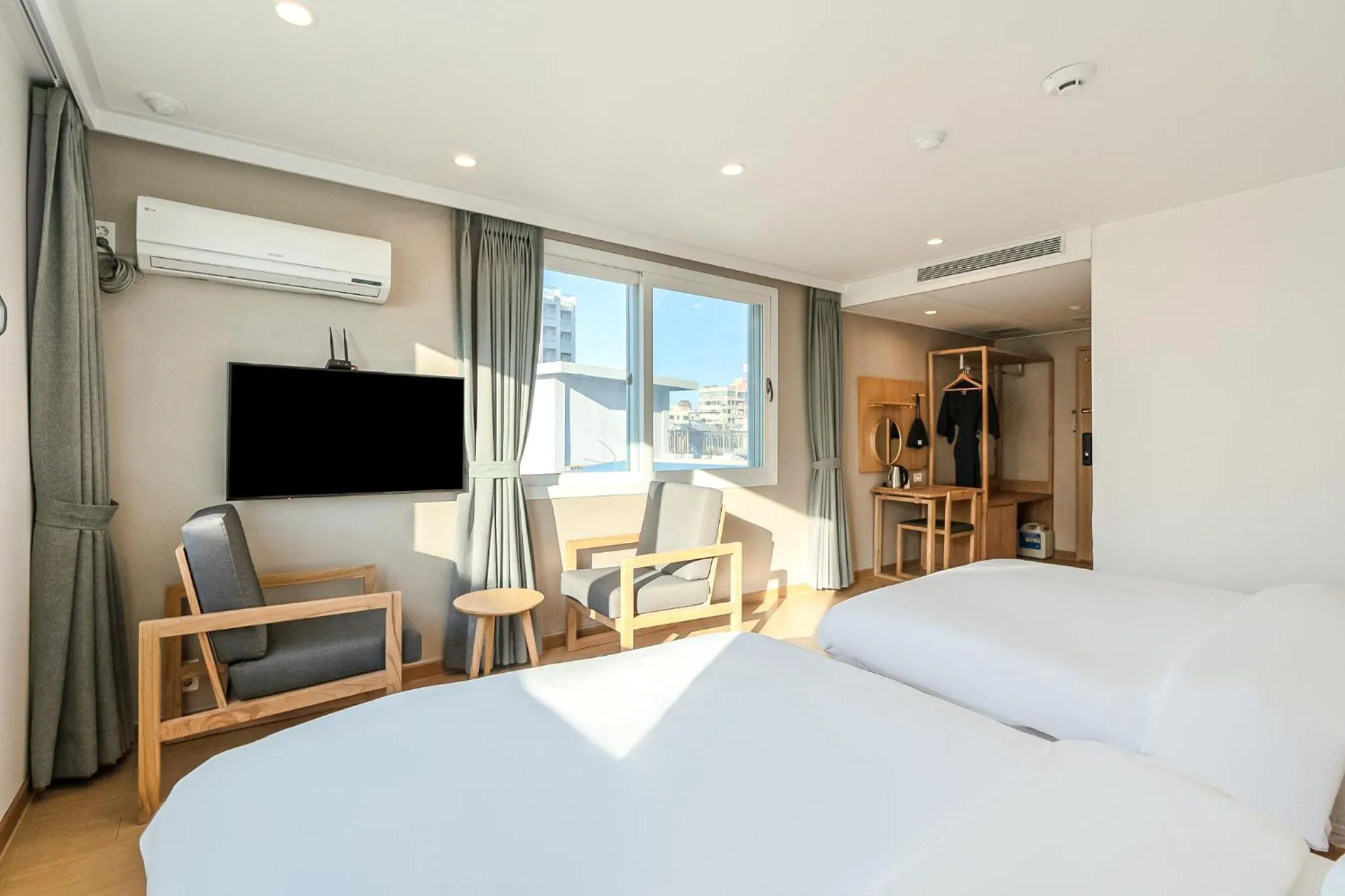 Bed in Heyy Seogwipo Hotel