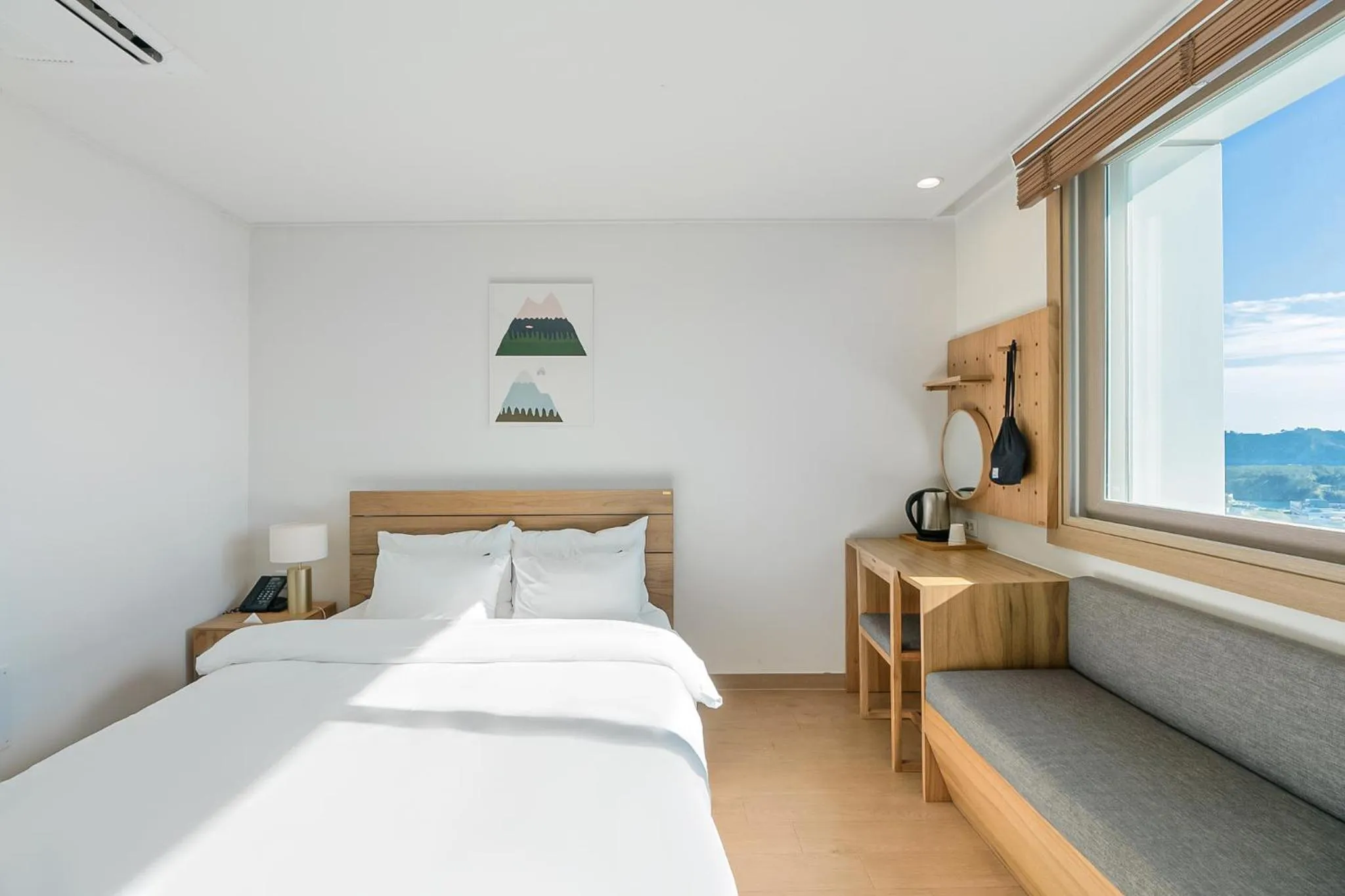 Bed in Heyy Seogwipo Hotel