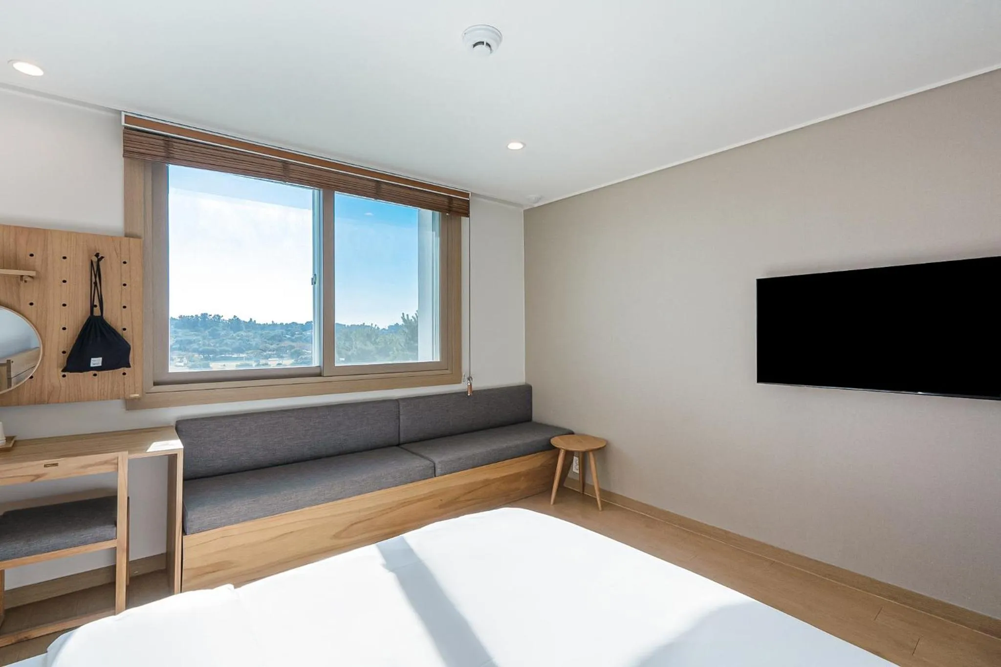 Bed in Heyy Seogwipo Hotel