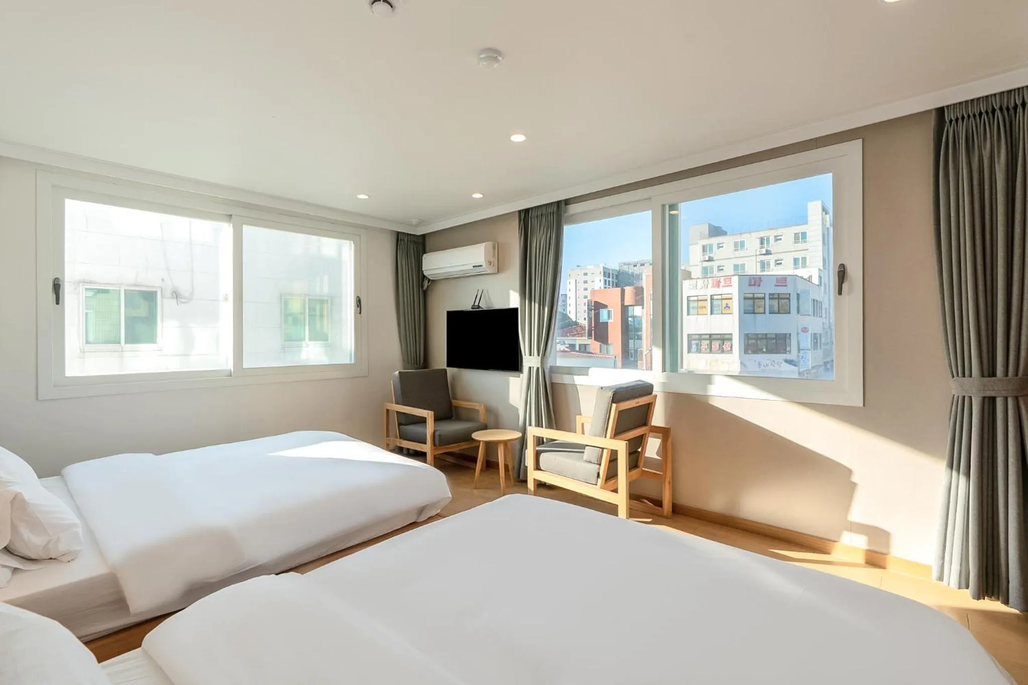 Bed in Heyy Seogwipo Hotel