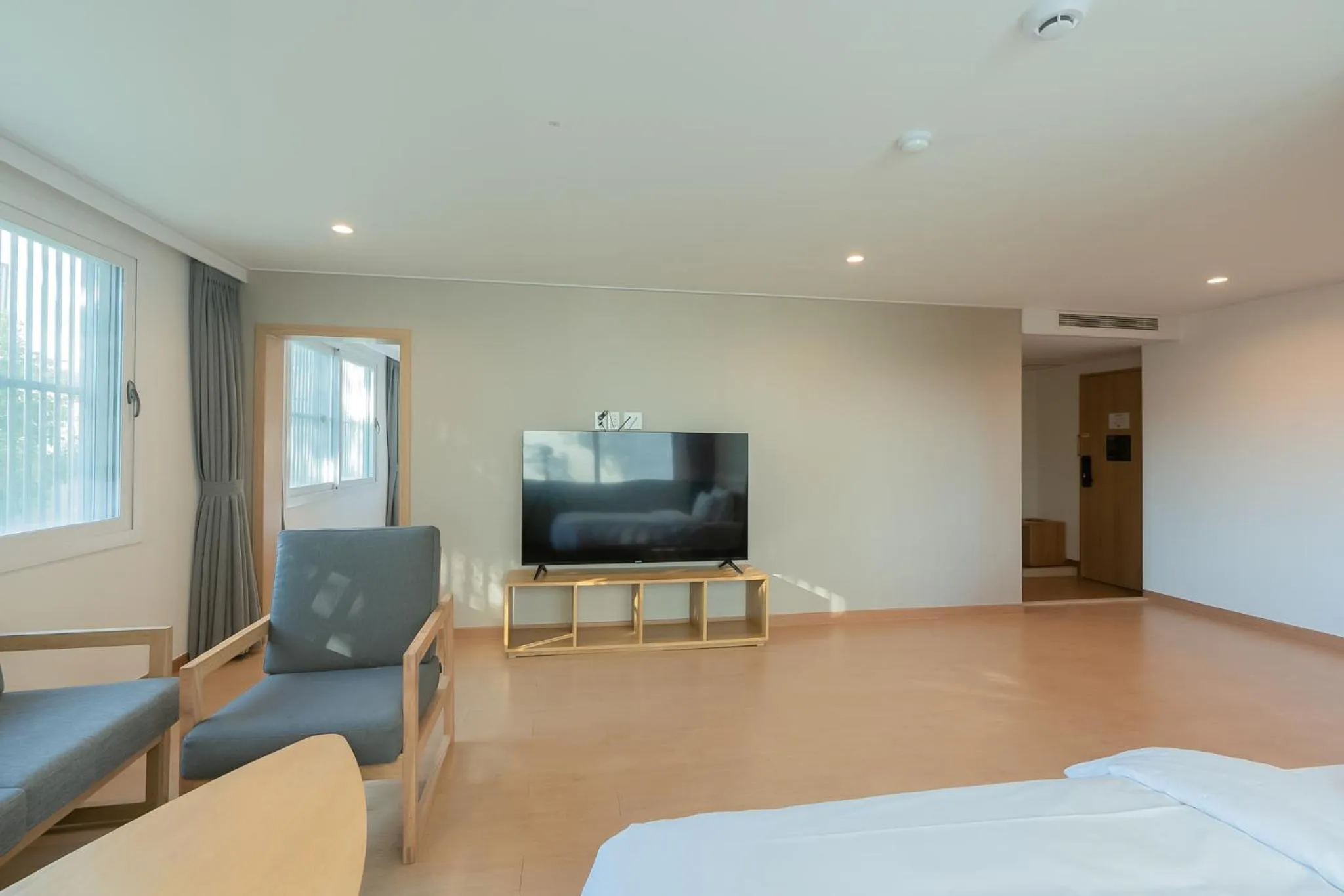 Bed in Heyy Seogwipo Hotel