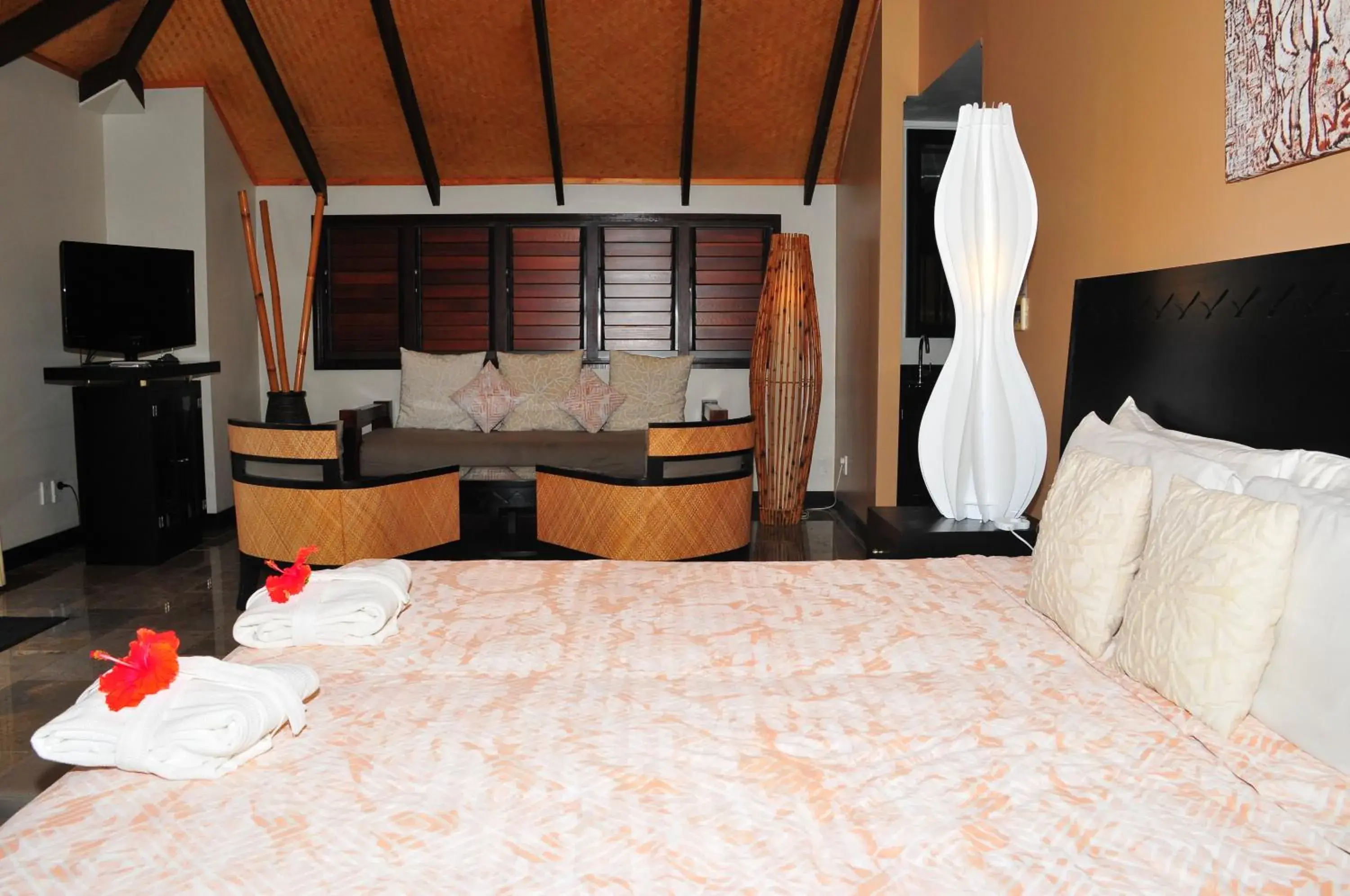 Bed in Crown Beach Resort & Spa Bed in Crown Beach Resort & Spa