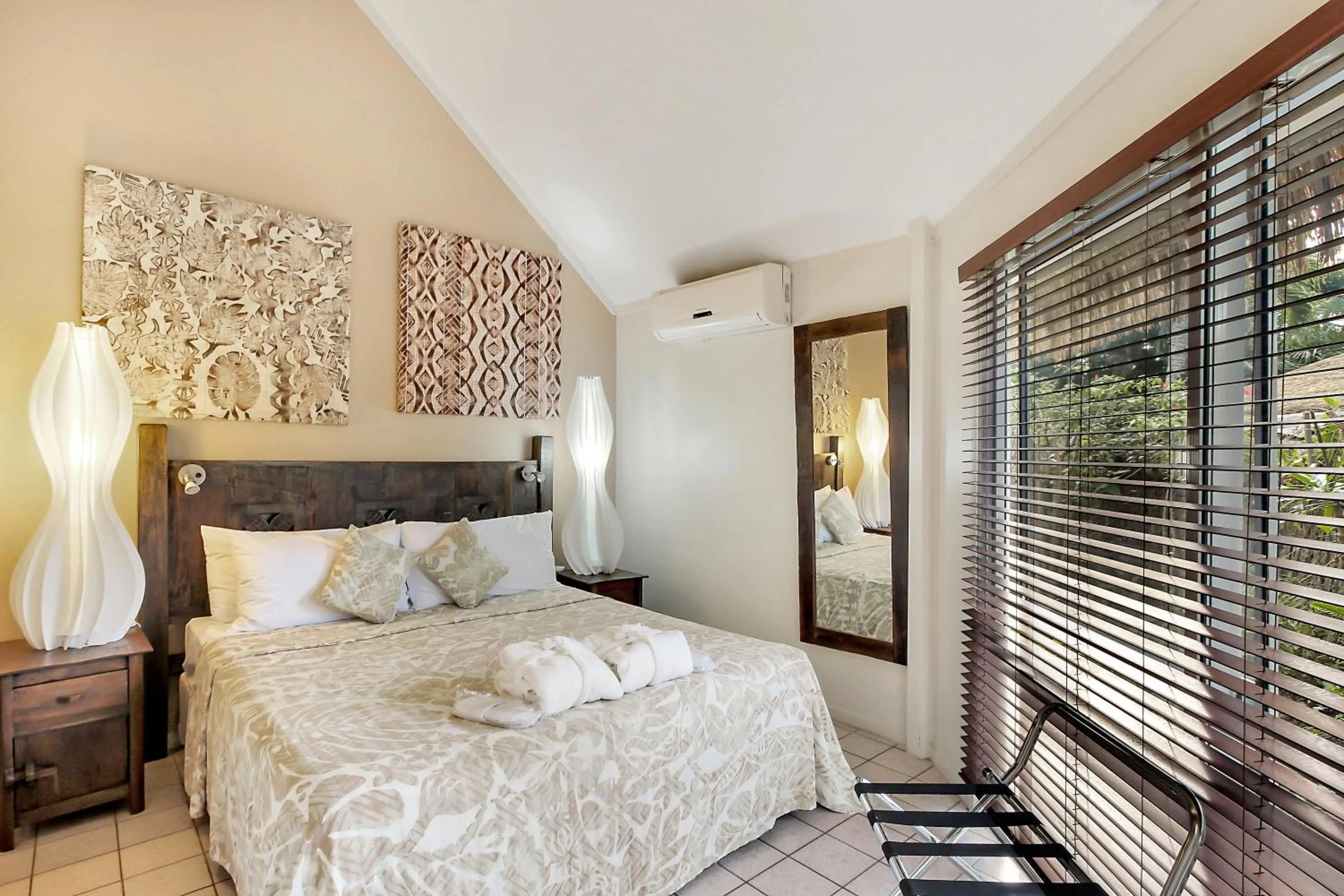 Bed in Crown Beach Resort & Spa