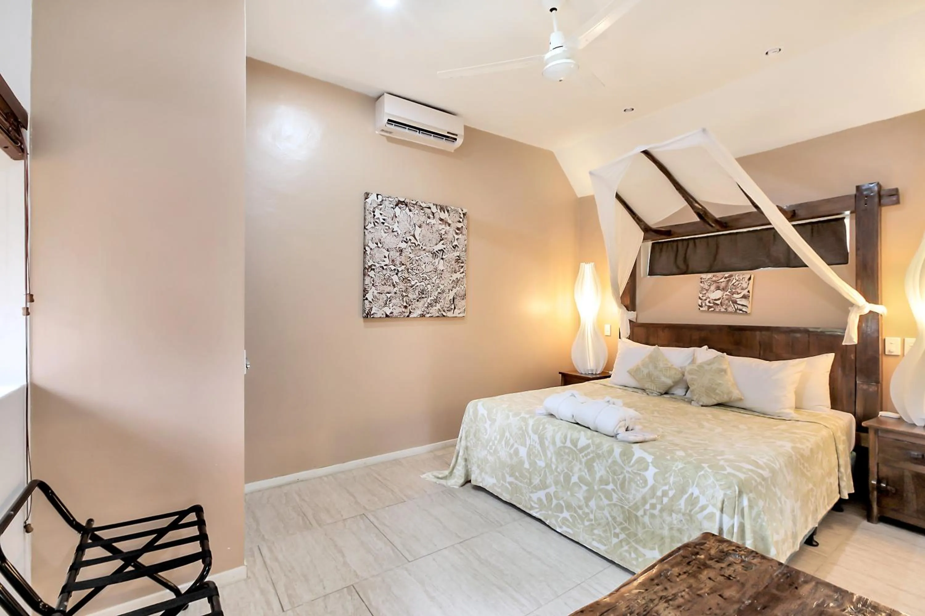 Bed in Crown Beach Resort & Spa