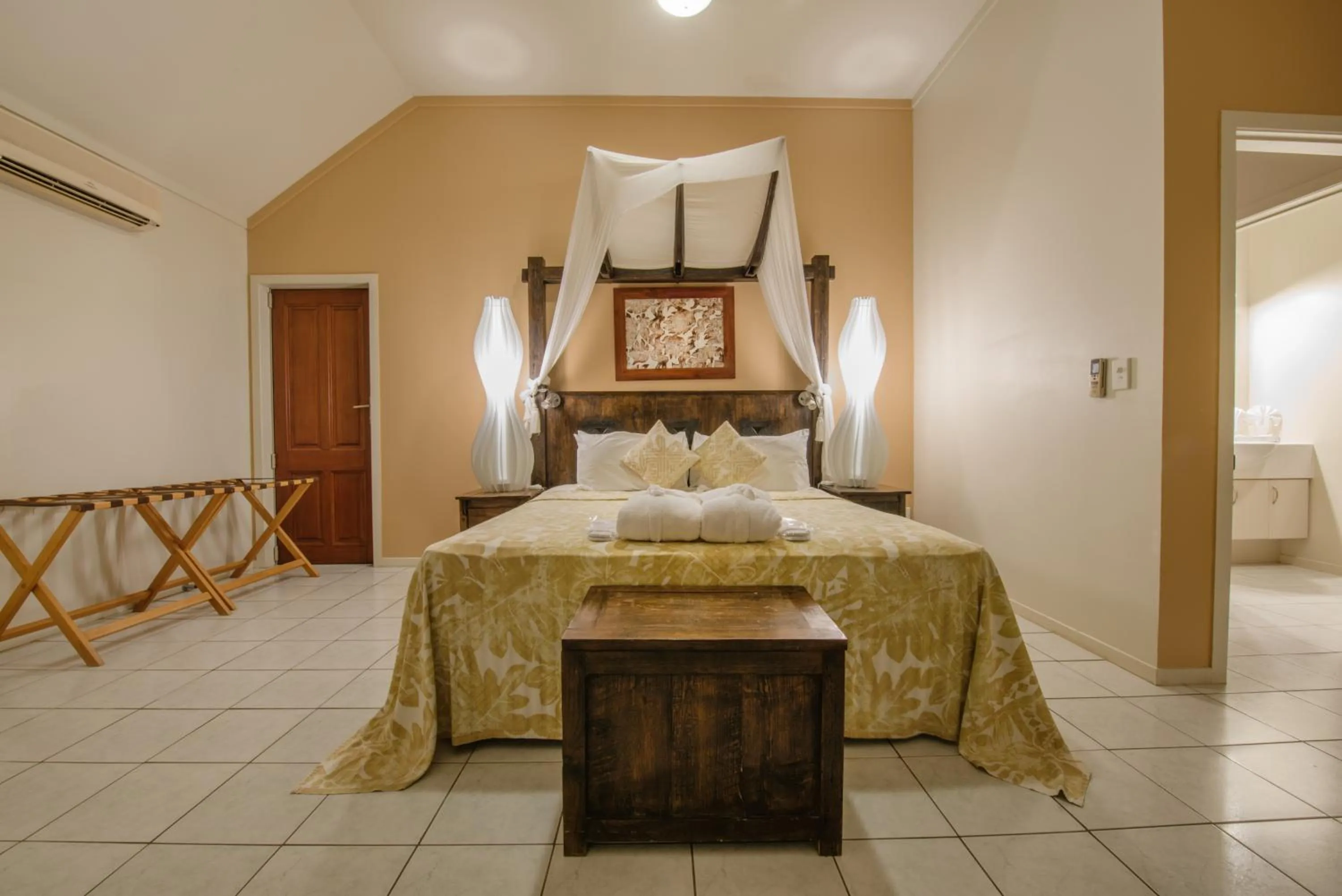 Bed in Crown Beach Resort & Spa