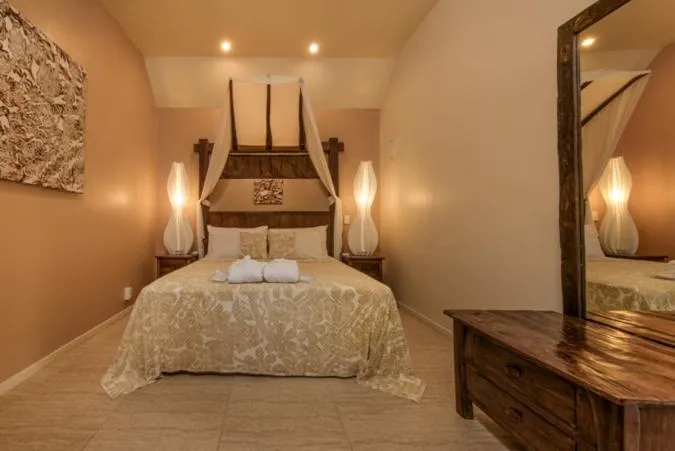 Bed in Crown Beach Resort & Spa