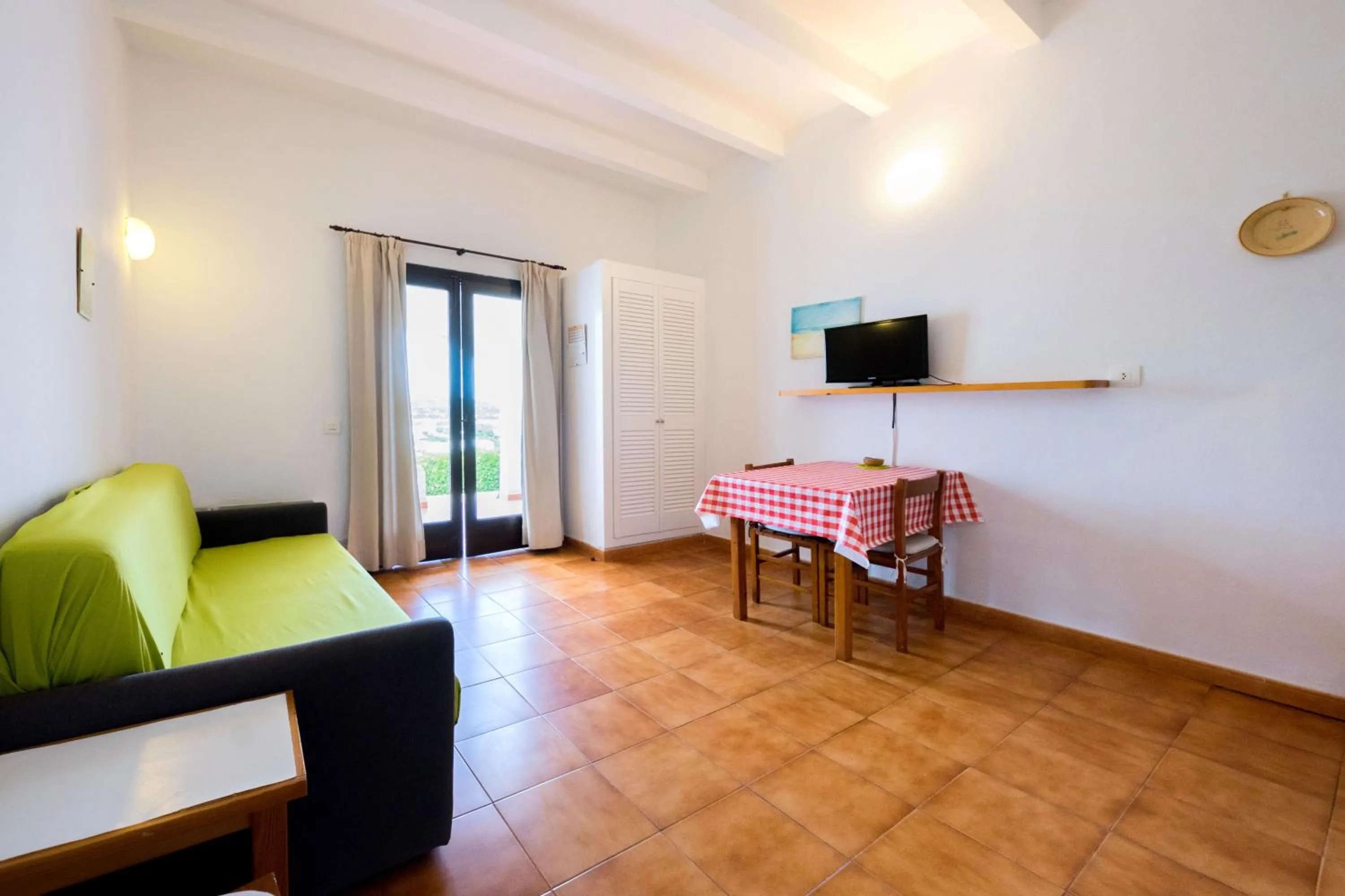 Seating area in Apartamentos Sa Cala