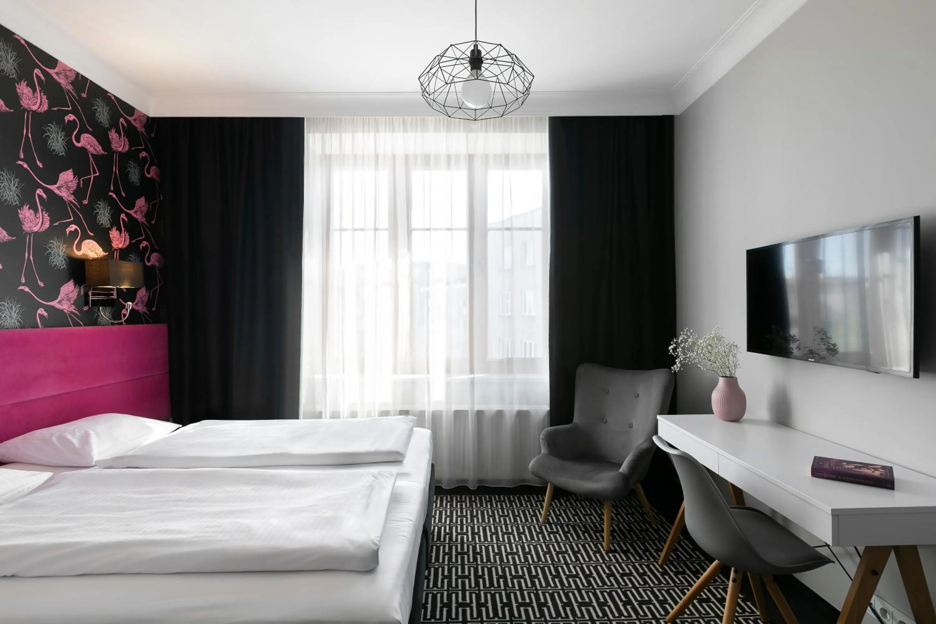 Bed in Liv'Inn Aparthotel