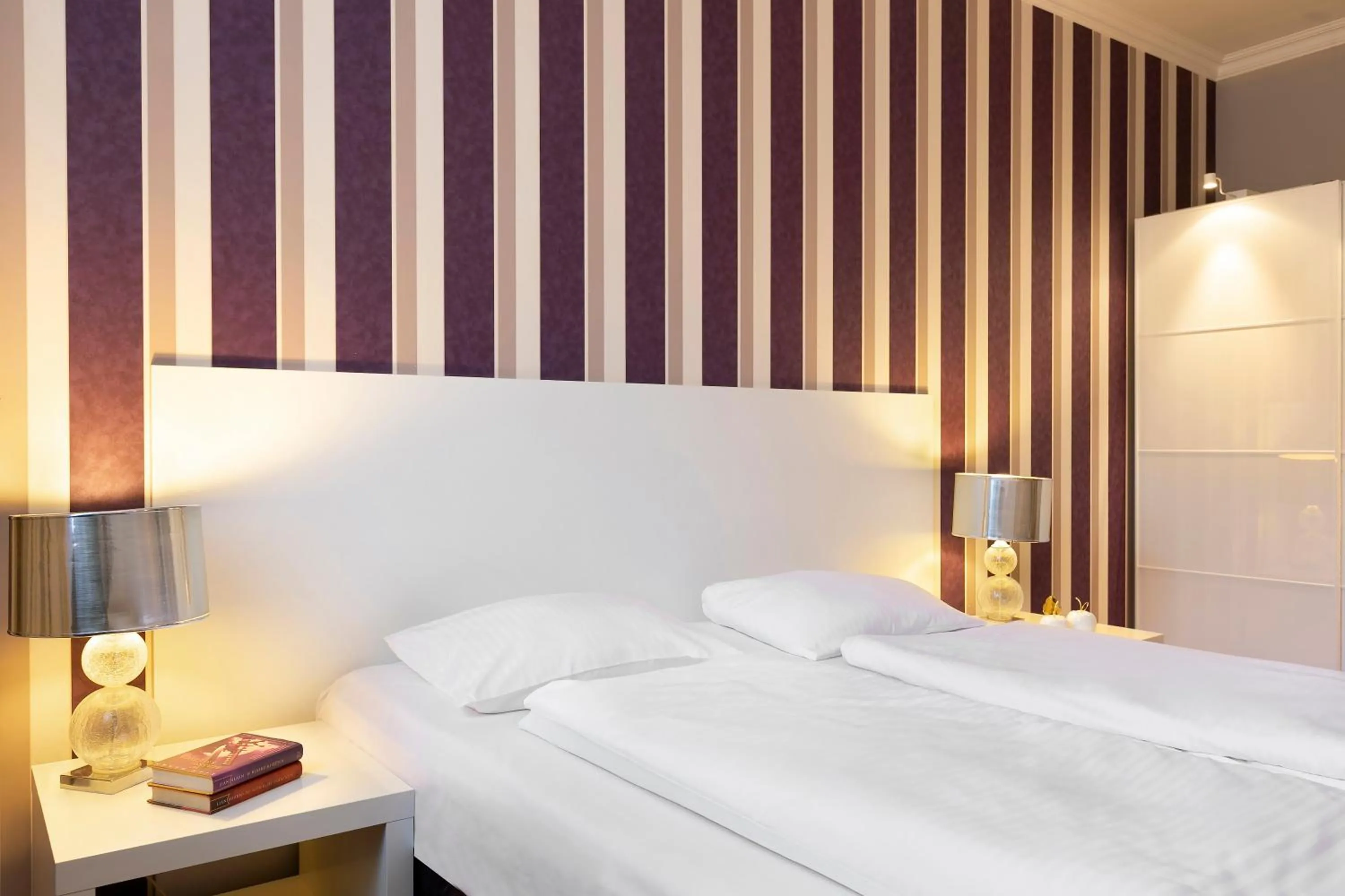 Bed in Liv'Inn Aparthotel