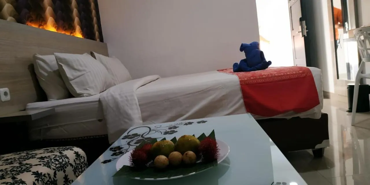 Bed in Mel's Inn Manado