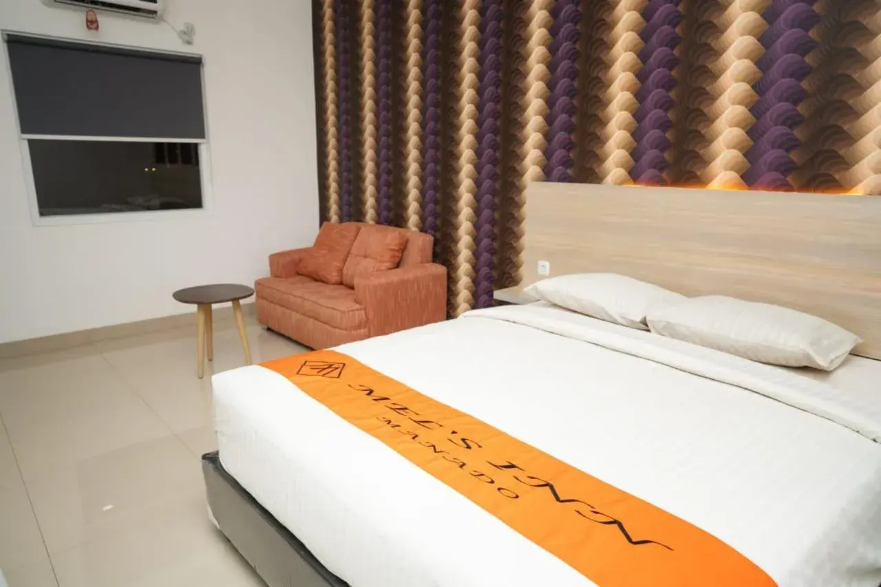 Bed in Mel's Inn Manado Bed in Mel's Inn Manado