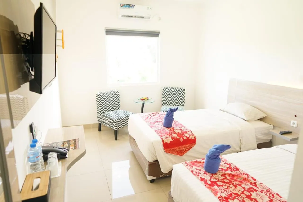 Bed in Mel's Inn Manado