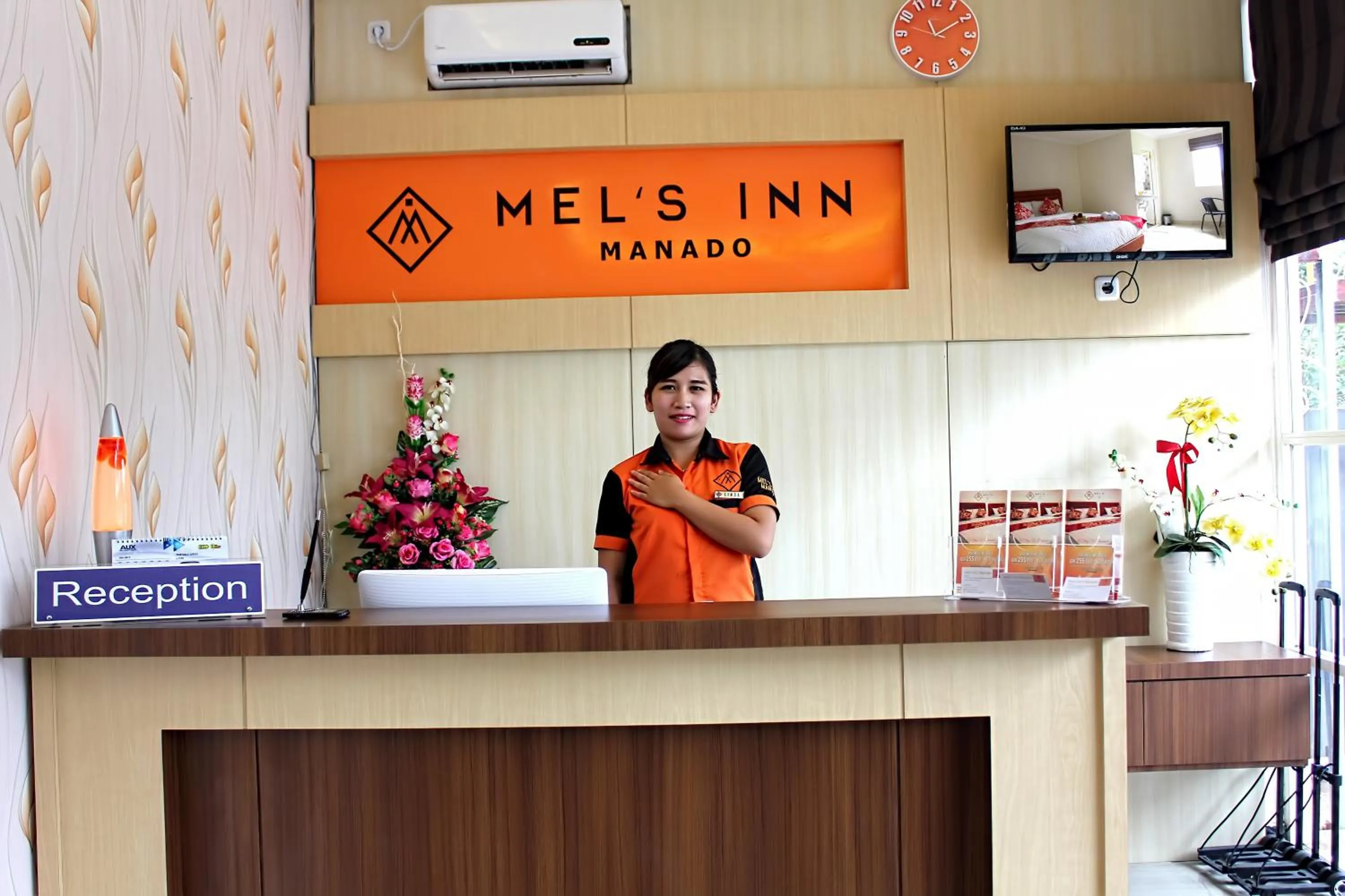 Property logo or sign in Mel's Inn Manado