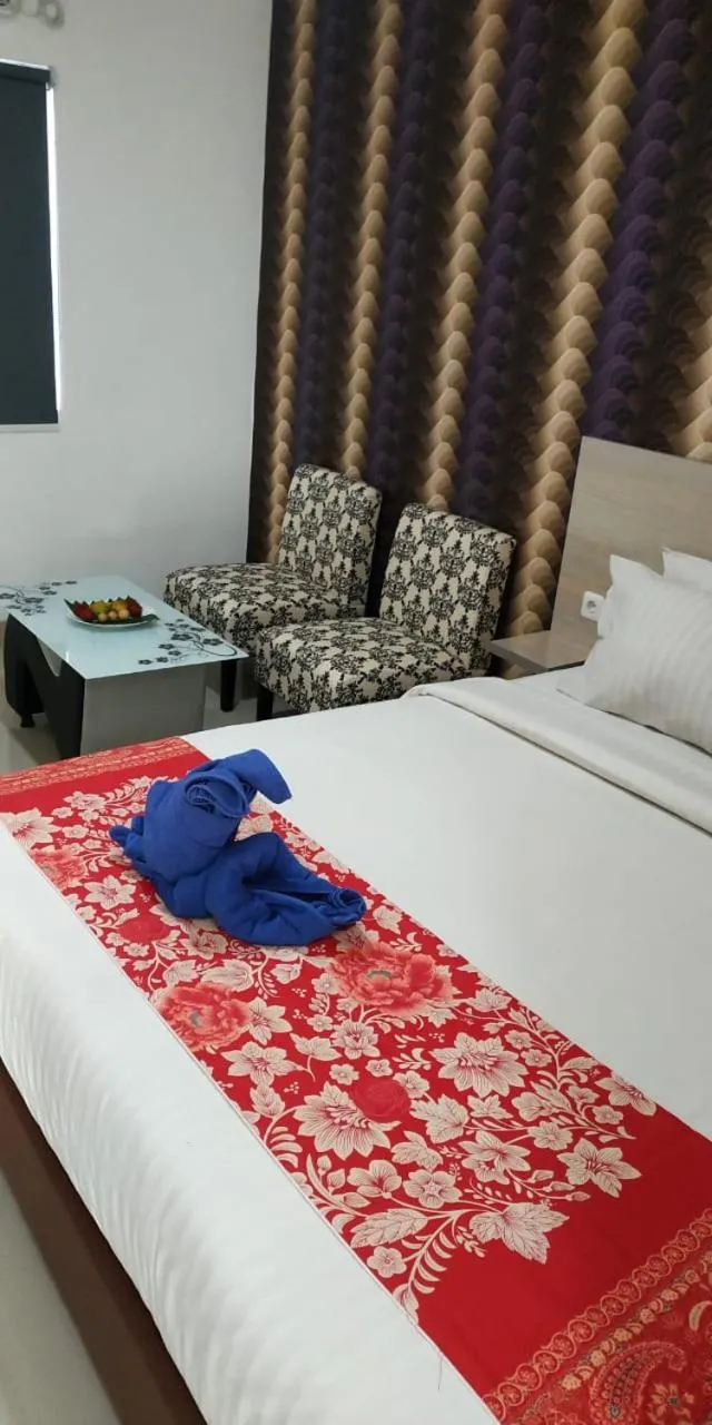 Bed in Mel's Inn Manado