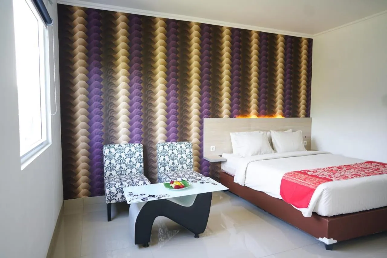 Bed in Mel's Inn Manado