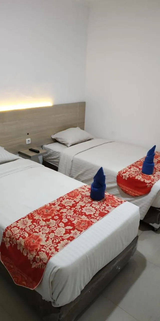 Bed in Mel's Inn Manado