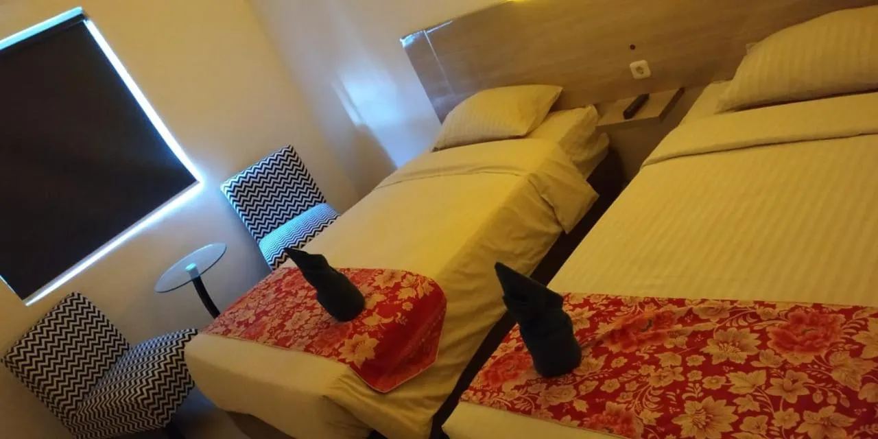 Bed in Mel's Inn Manado