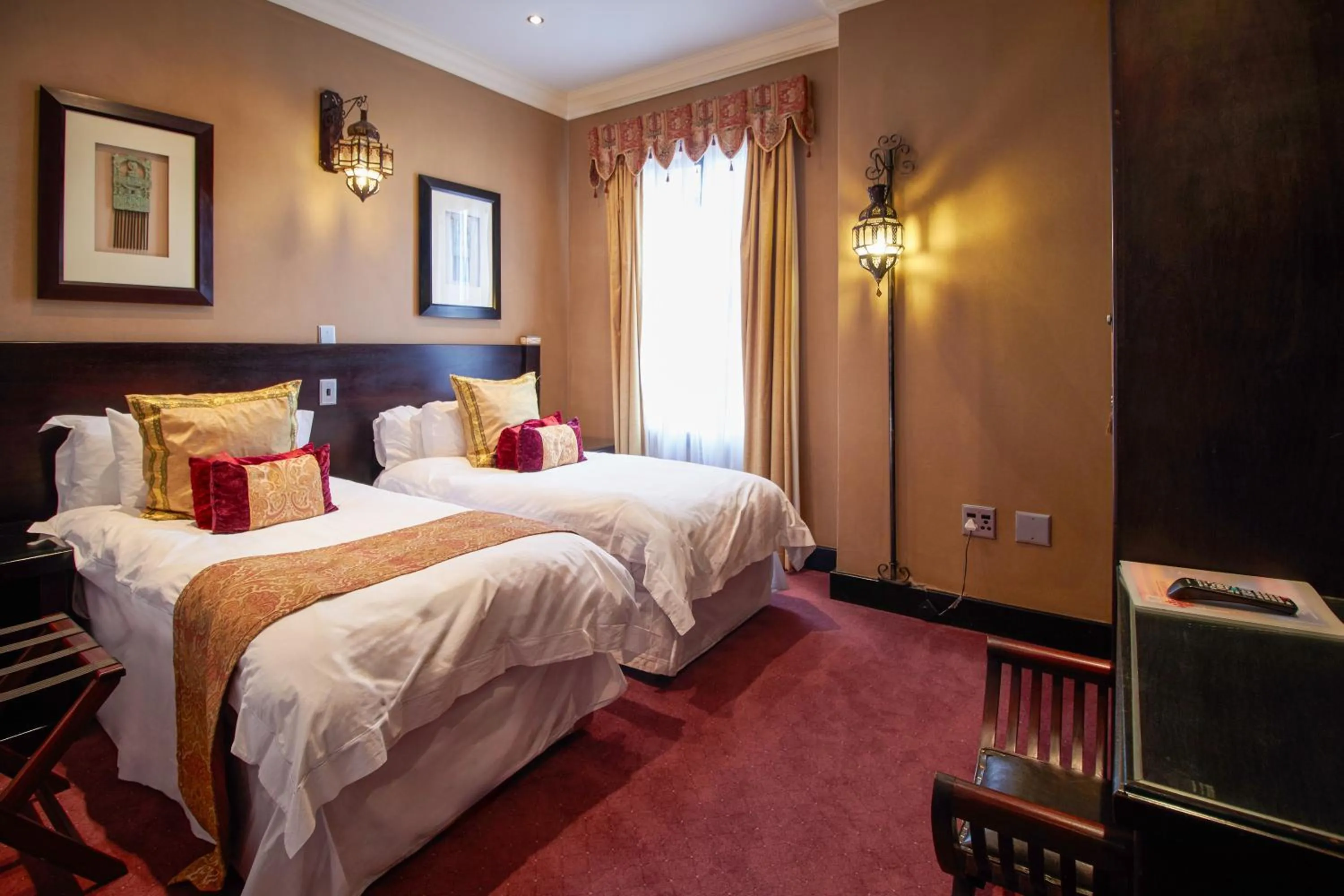 Bed in Royal Elephant Hotel & Conference Centre
