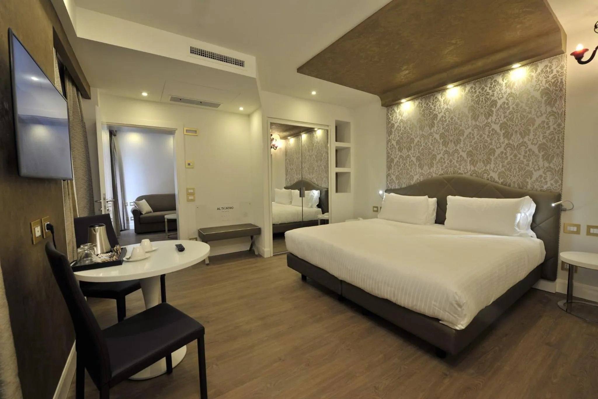 Photo of the whole room, Bed in Al Theatro Palace