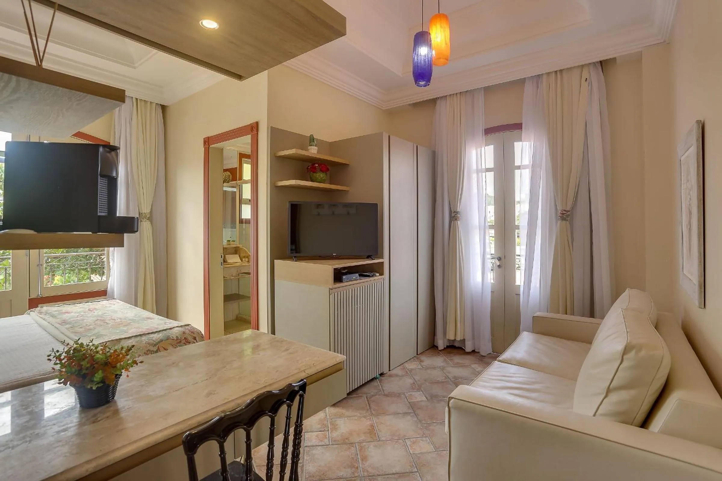 TV and multimedia, Bed in Villas Jurerê Hotel Boutique