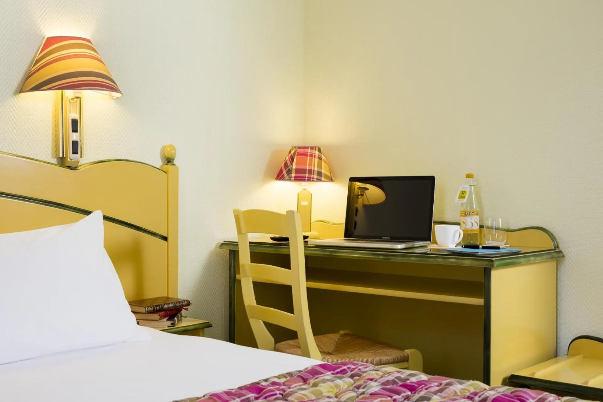 Bedroom in Logis Hôtel Restaurant Les Cèdres