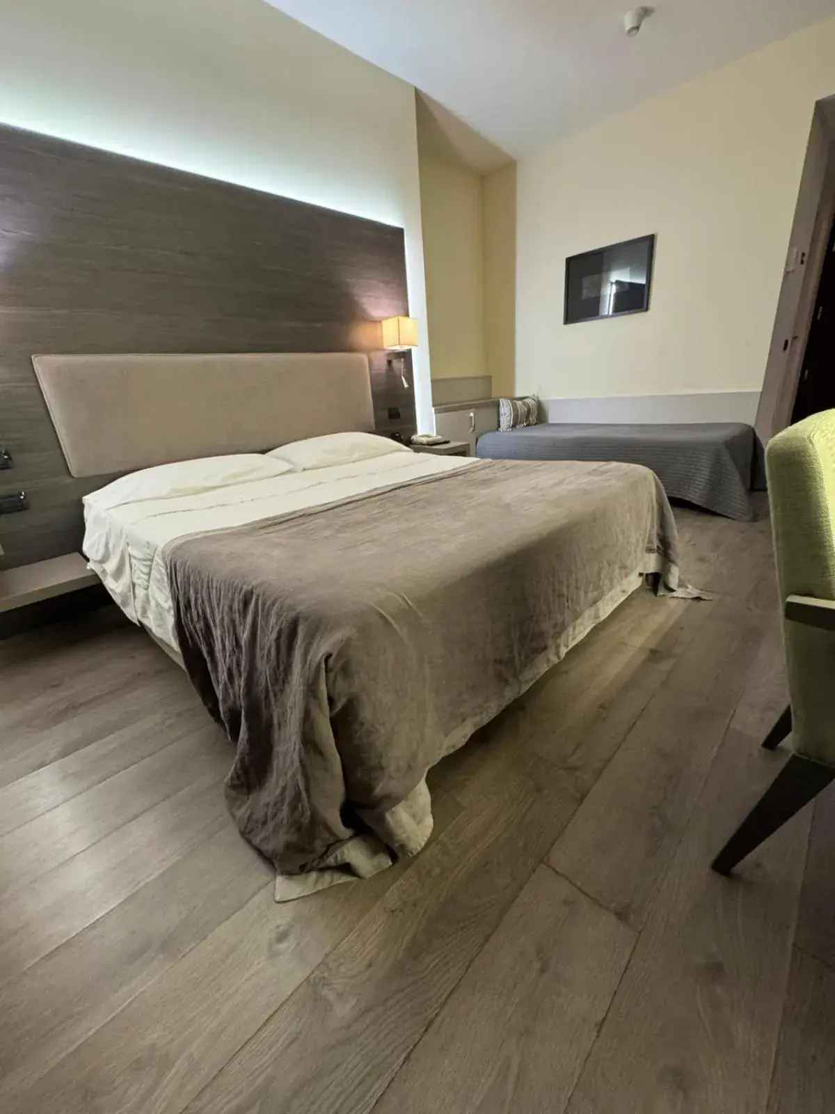 Superior Triple Room with Balcony and Lake/Square View - single occupancy in Hotel Giardino Superior Triple Room with Balcony and Lake/Square View - single occupancy in Hotel Giardino