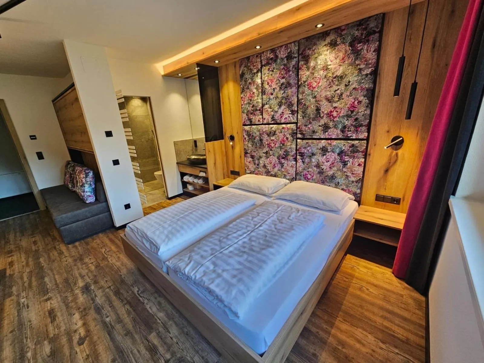 Photo of the whole room, Bed in first mountain Hotel Zillertal