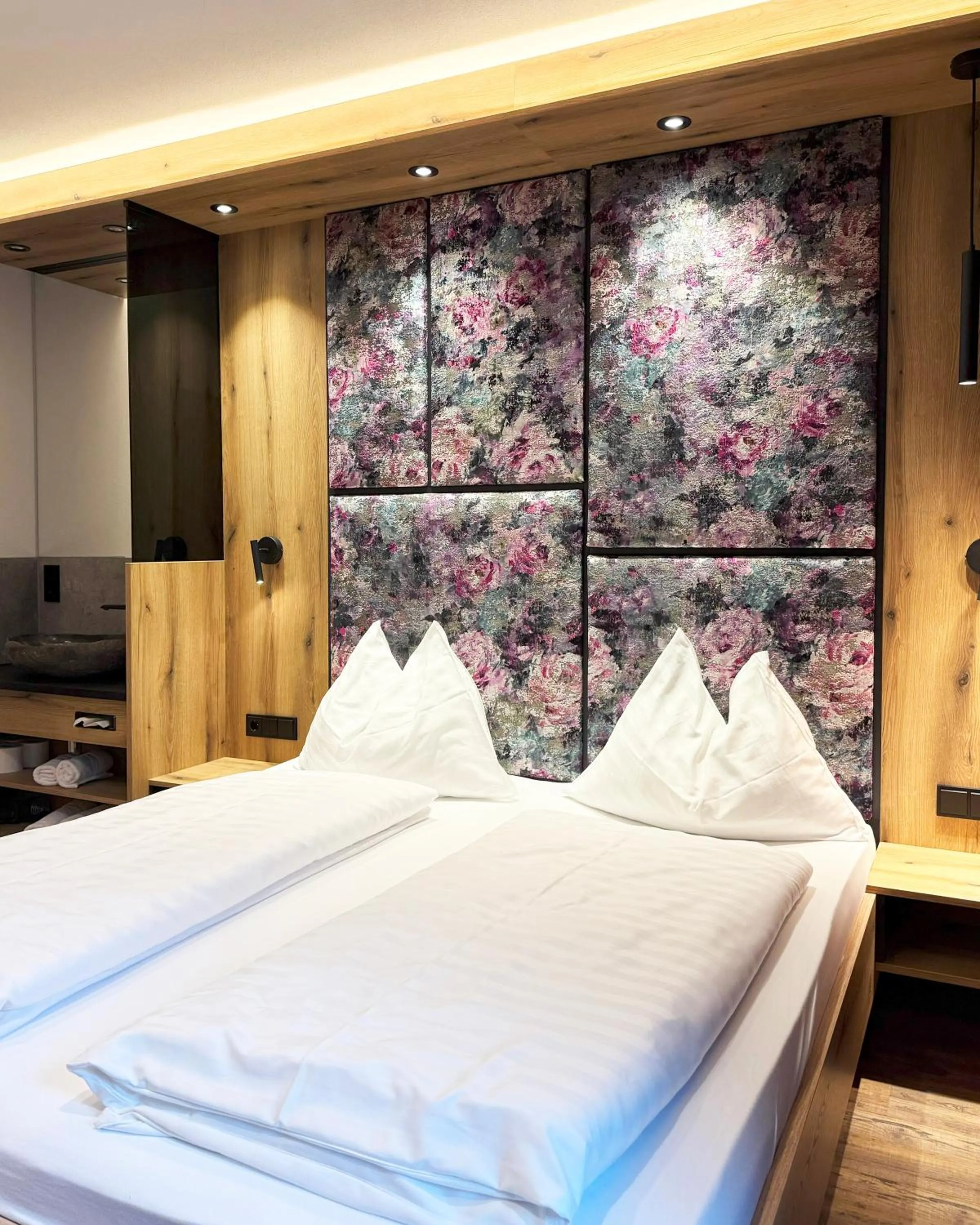 Bedroom, Bed in first mountain Hotel Zillertal